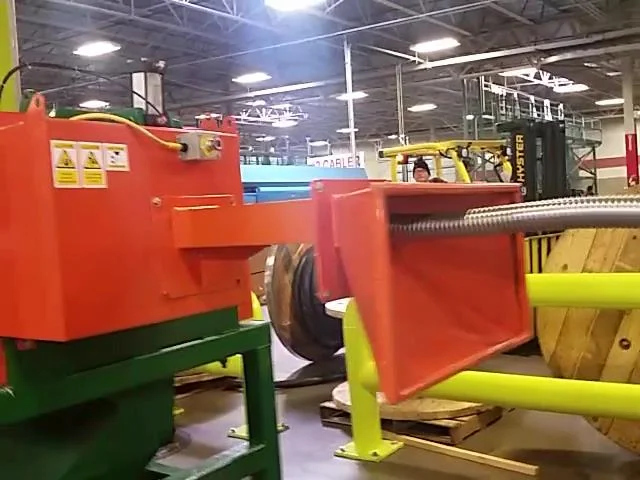 Large BX Cable being despooled and chopped by Sweed's 5703 XHD