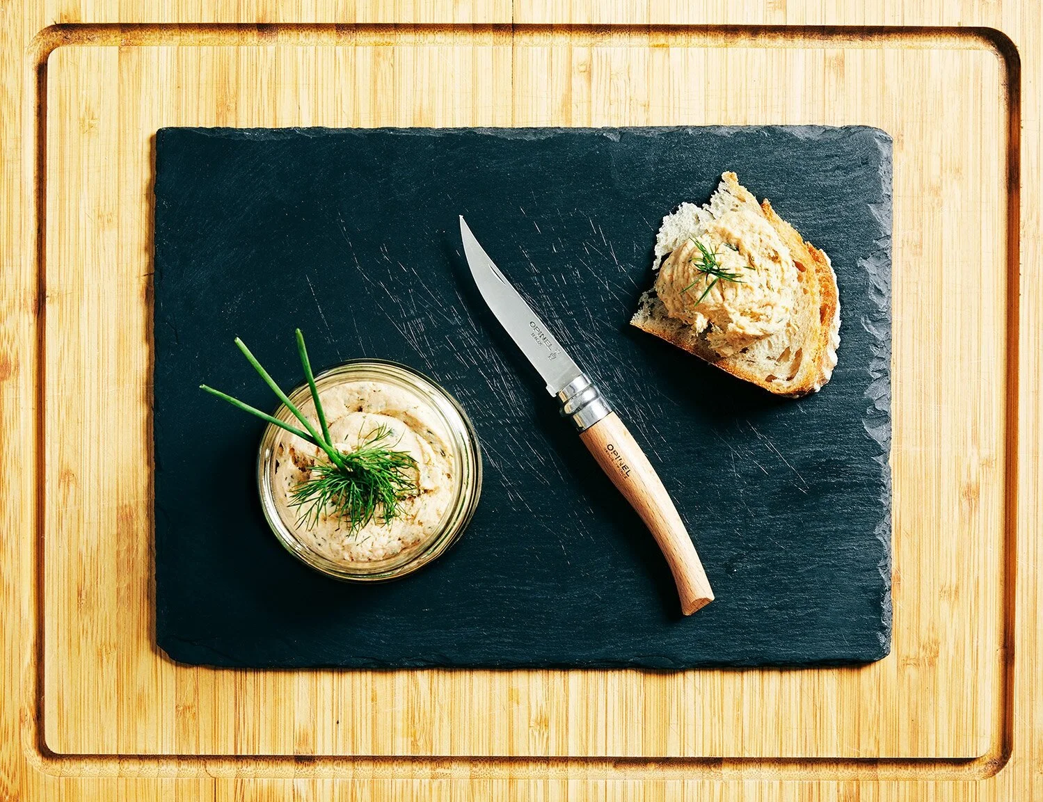 Salmon Rillette served on a slate