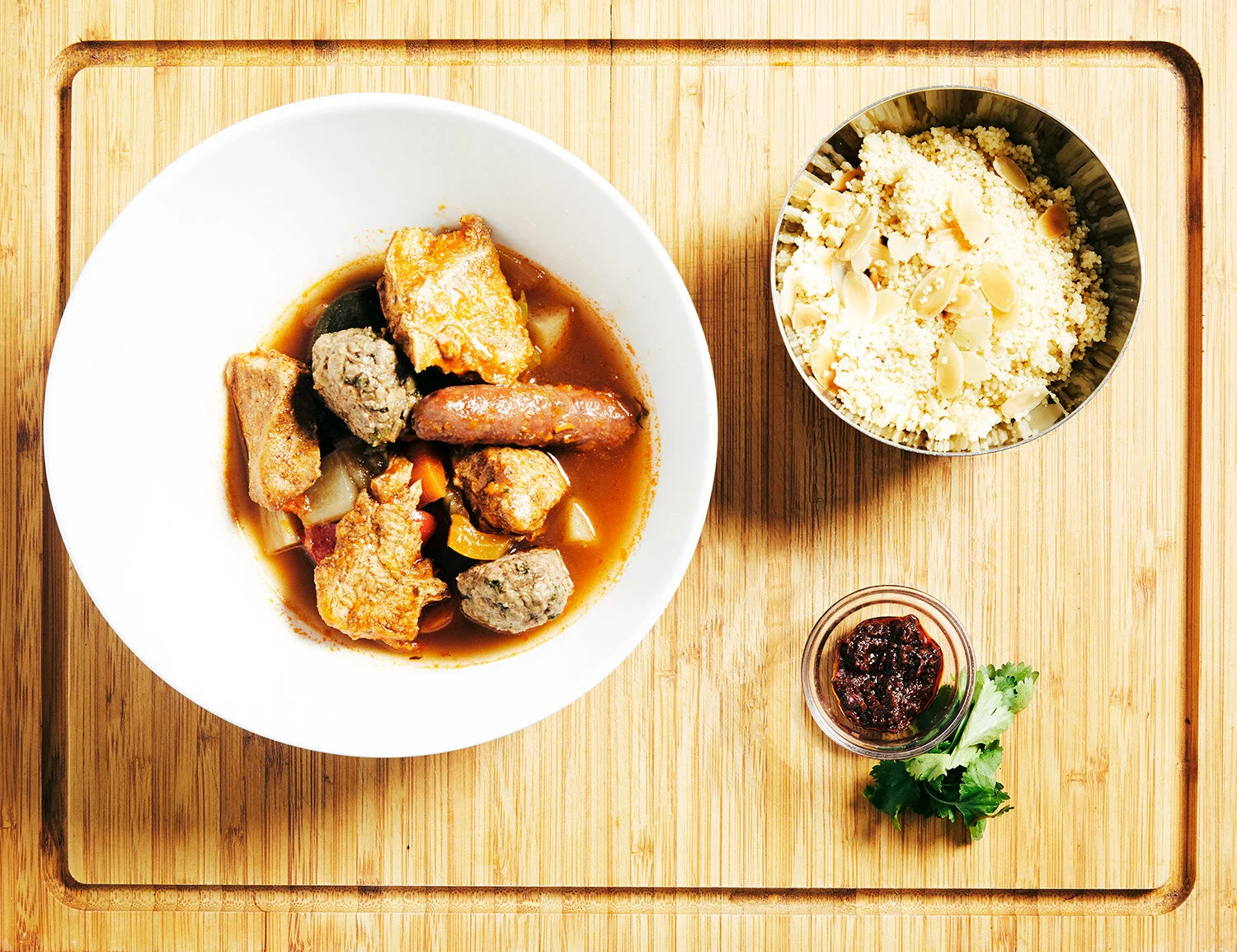 Couscous Royal: Stew served in one bowl and couscous in another.