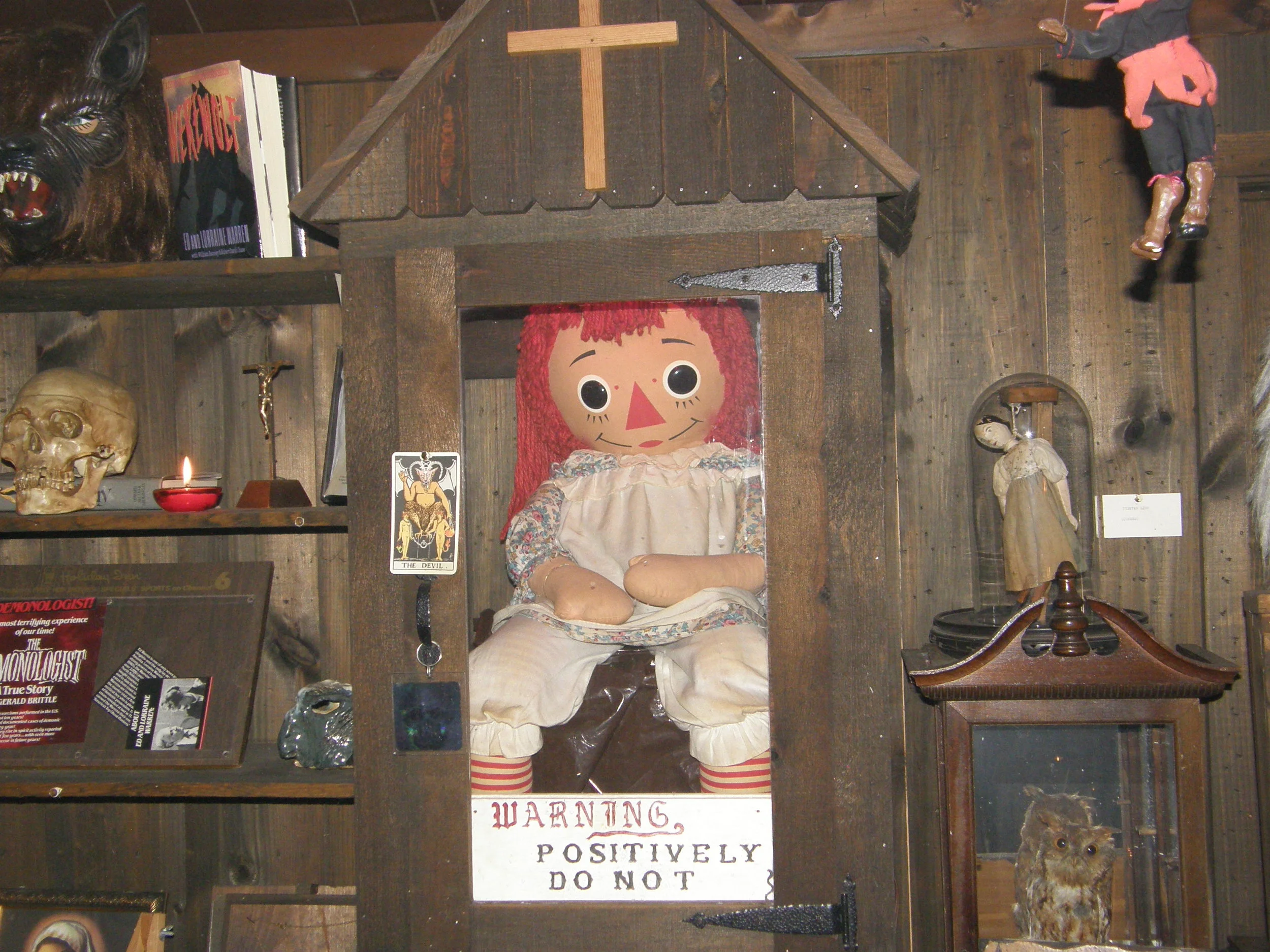 Photo of the real Annabelle doll that currently sits in the Warren’s Occult Museum (Photo found via Reddit)