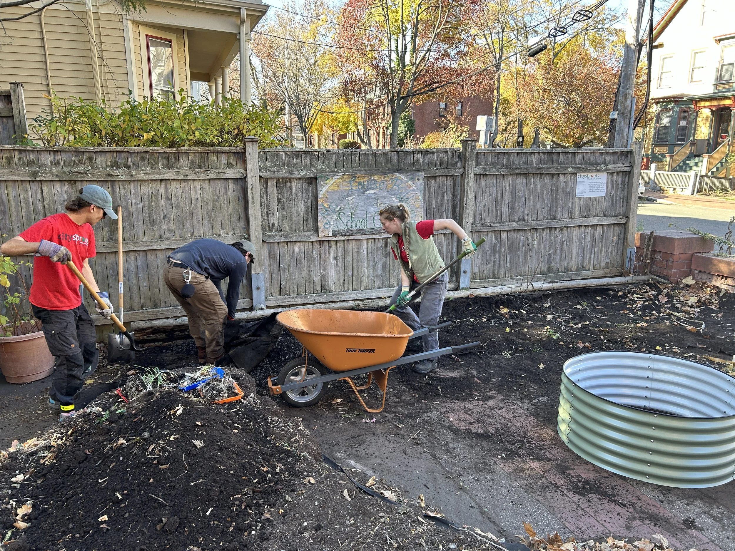 Baldwin - staff shoveling dirt.JPG