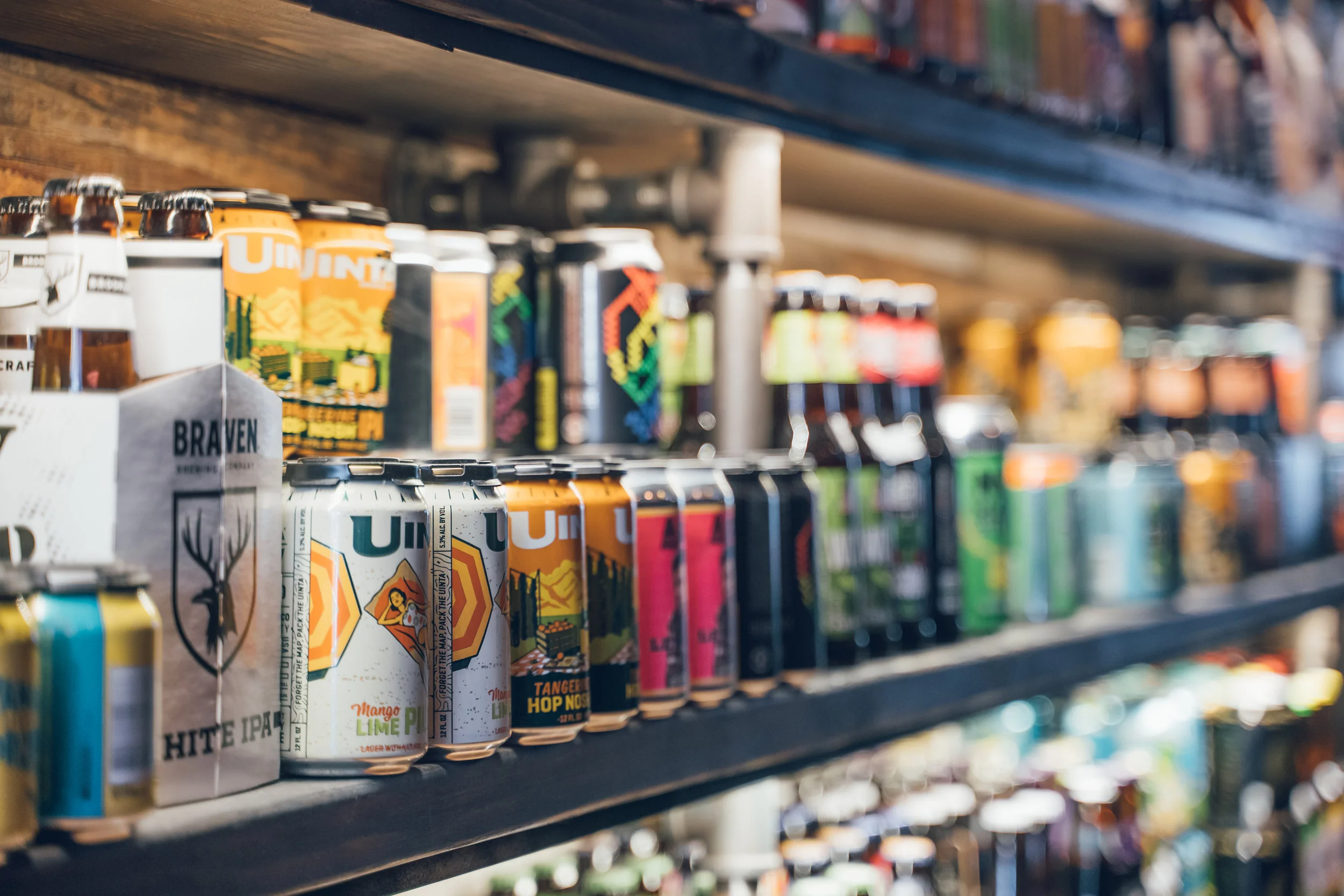 Fully stocked shelves of craft beer.jpg