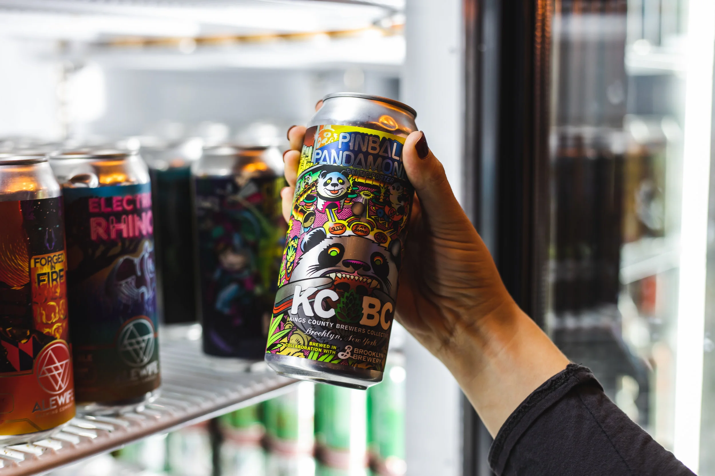 Hand grabbing beer out of cooler.jpg