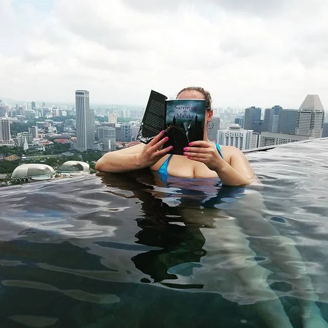 What's your infinity poolside read? 🌺😎🌏📖 Check out Surviving the Malaka, the dramatic tale of a NYC bartender fresh out of college, who struggles to survive in the city that never sleeps.

#survivingthemalaka #amazon #fiction #bartenderlife #newy