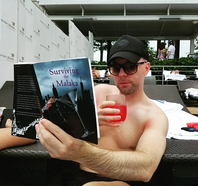 Sippin' cocktails poolside &amp; reading about bartending in NYC... when you catch your friends reading your book. 🍹📖 Available on @amazon &amp; @goodreads &amp; lulu.com 
#survivingthemalaka #nyc #newyork #author #fiction #published #books #writer