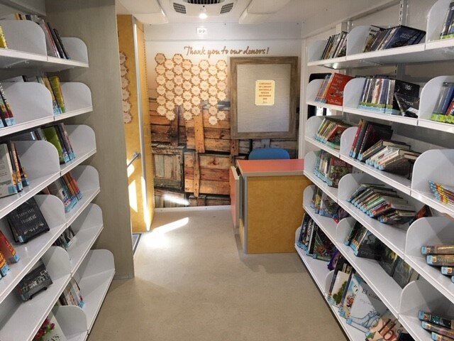 Bookmobile interior with wall and shelves.jpg