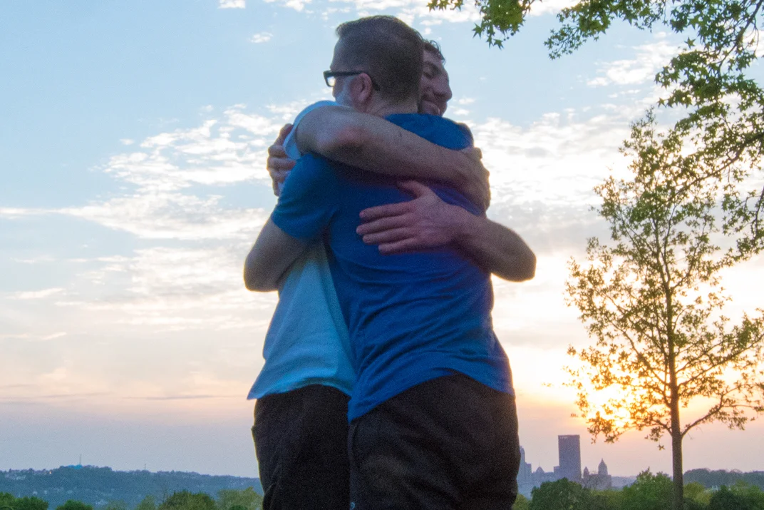 two-men-hugging-touch-practice-centered-presence-yoga-50 B.jpg