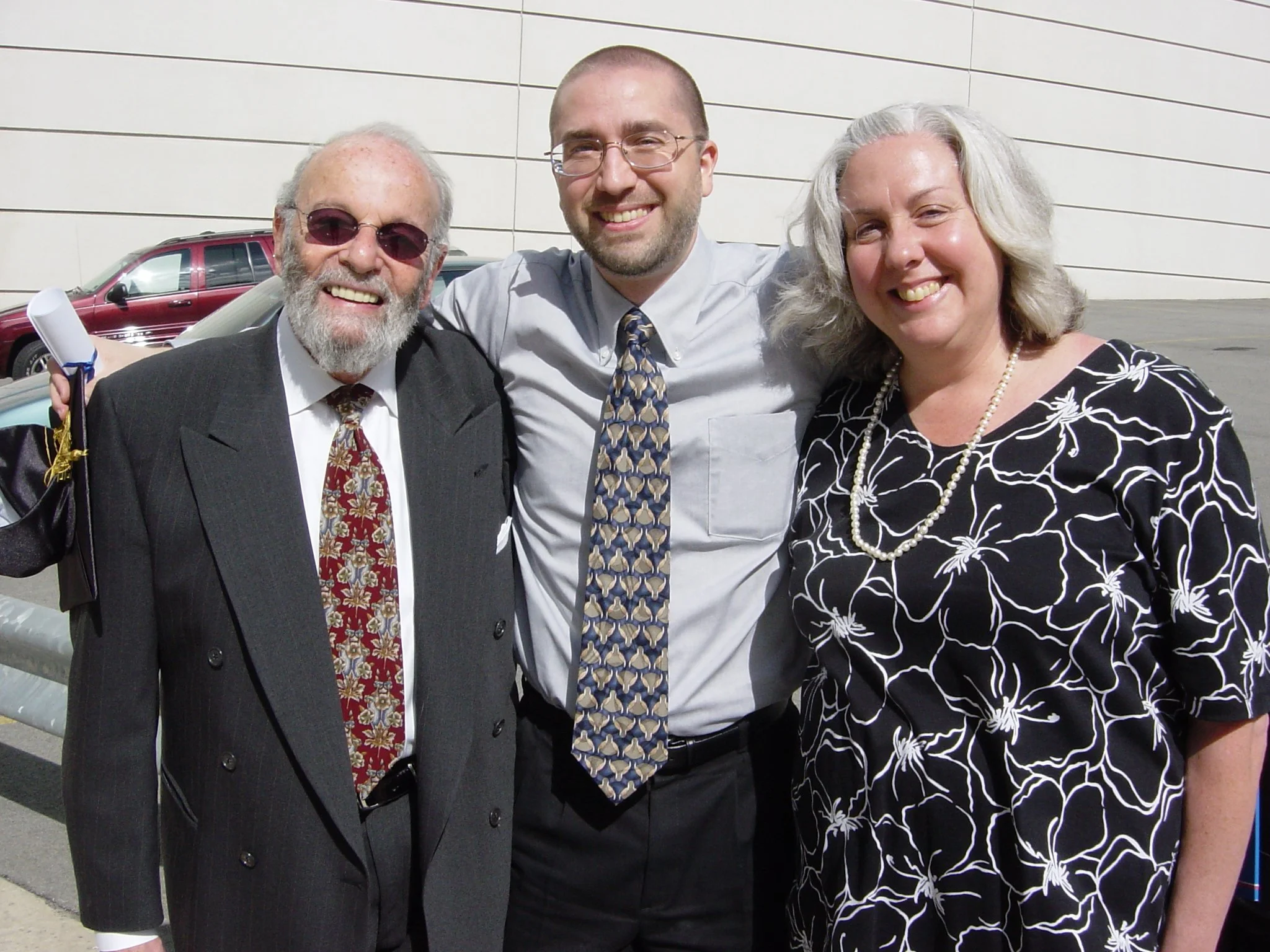 Michael Patrick with massage therapy mentors Emmanuel Baum and Cheryl Siniakin-Baum on graduation day May 2006