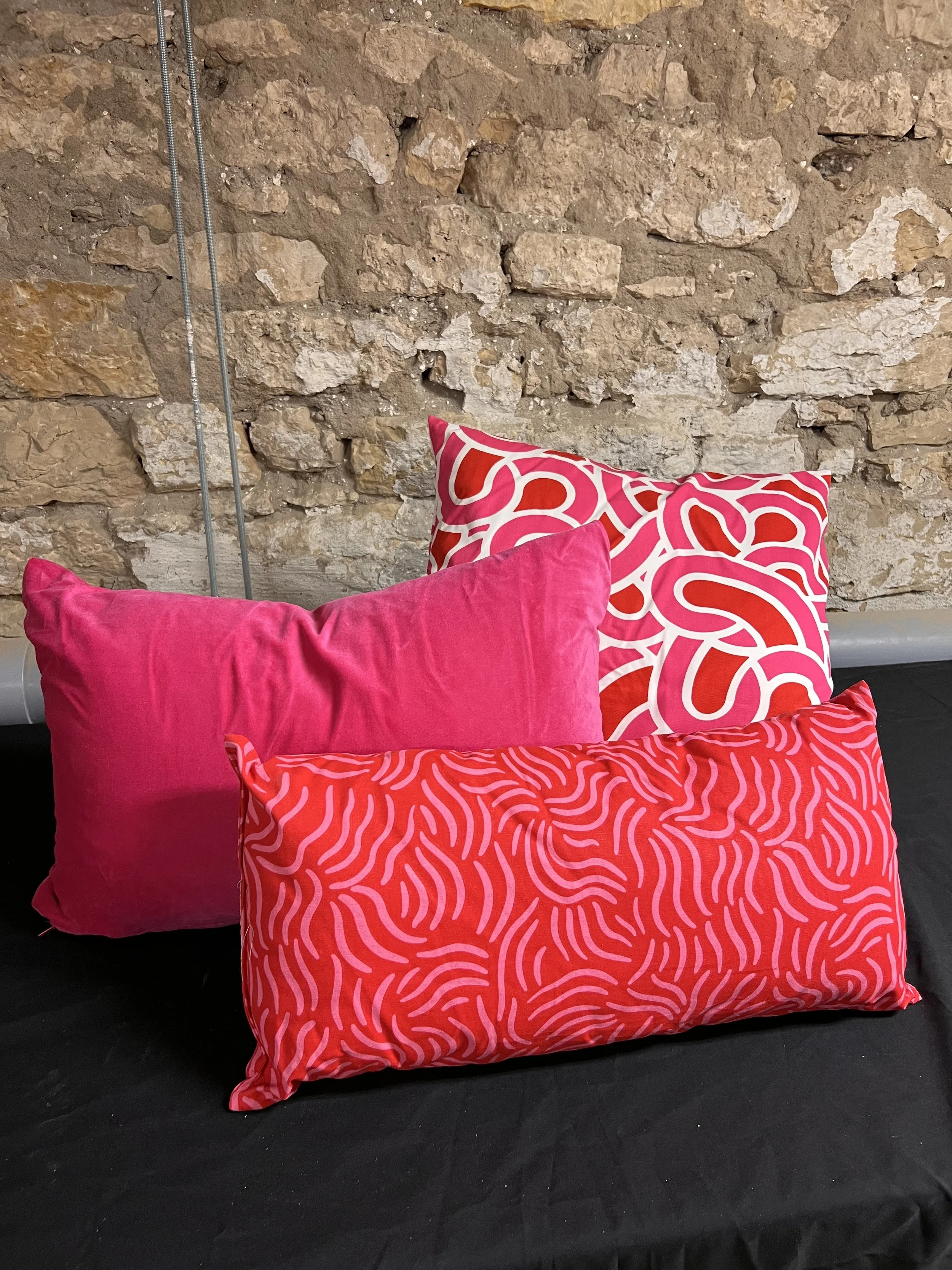 ASSORTED PINK PATTERNED PILLOWS