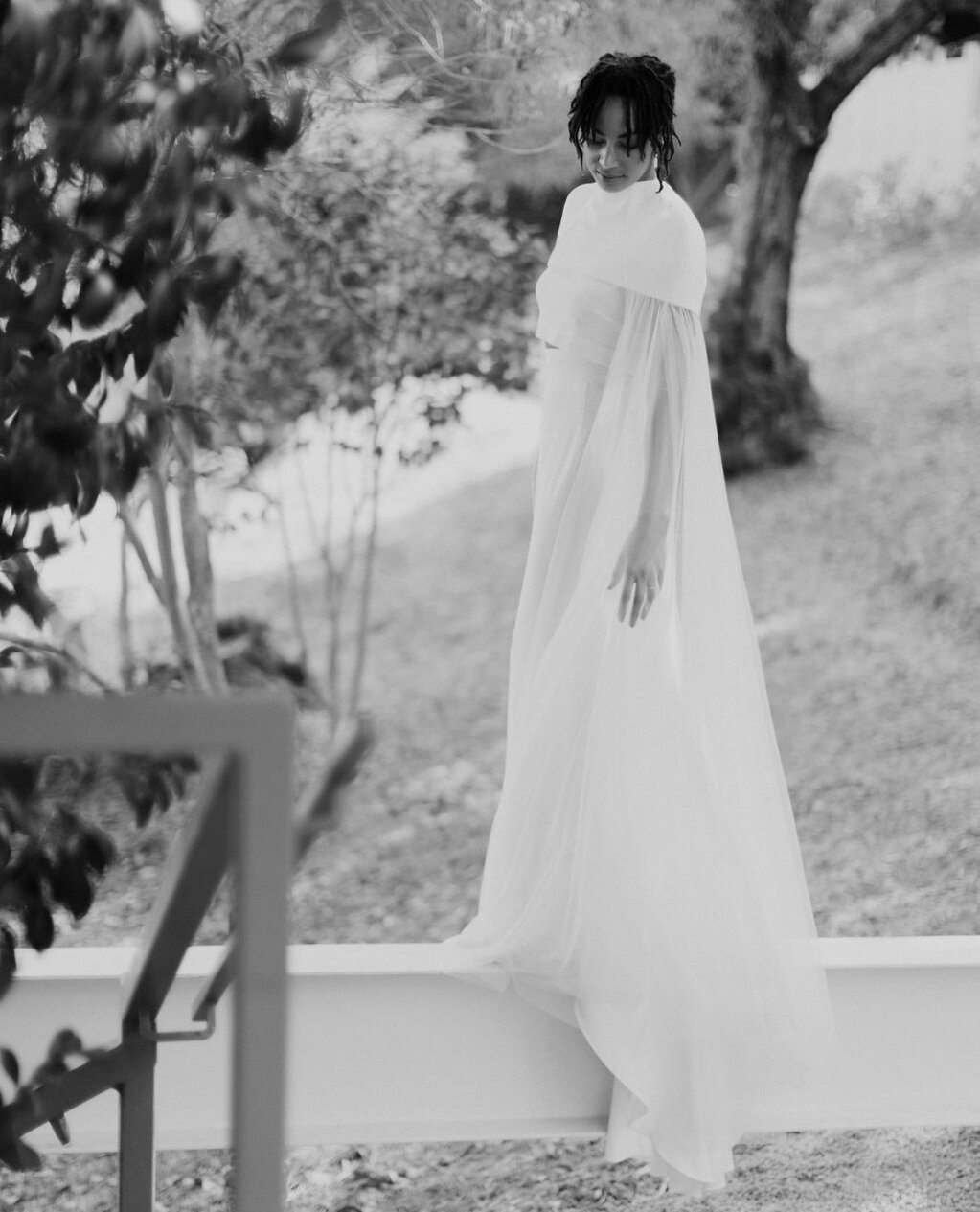 [ The MILA Cape ] ... structured cape with mock neckline, double panel and button detail, in silk crepe ⁠
⁠
⁠
⁠
⁠
⁠
⁠
⁠
⁠
⁠
#thelawbridal #bride #weddingdress #weddinginspo #minimalistbride #chicbride #bridetobe #modernbride #coolbride #engaged #mini