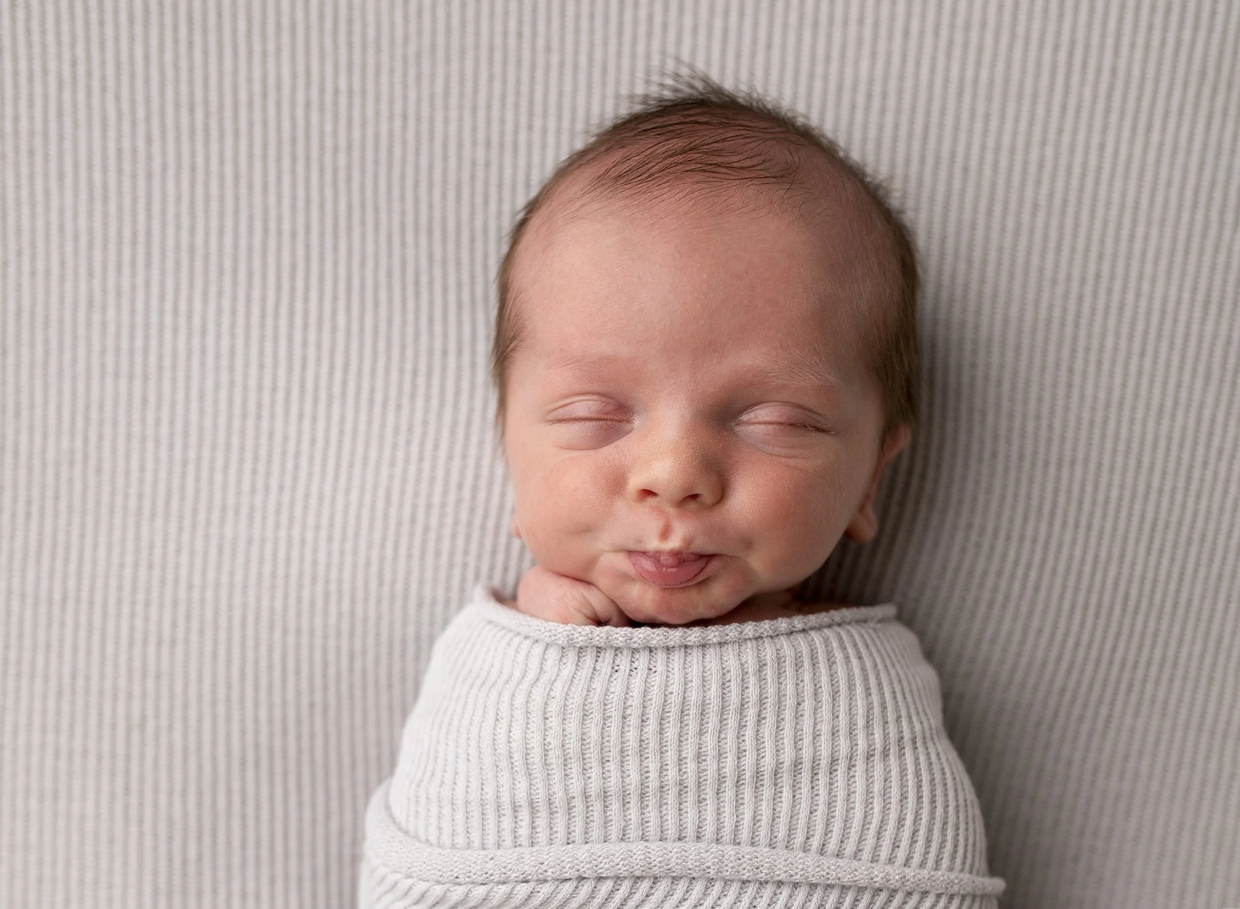 newborn-binky-pucker.jpg