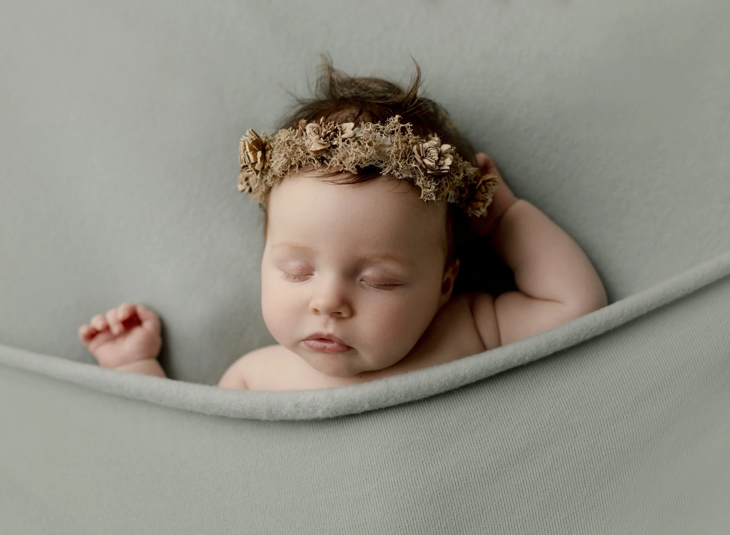 tucked-in-newborn-in-light-blue.jpg