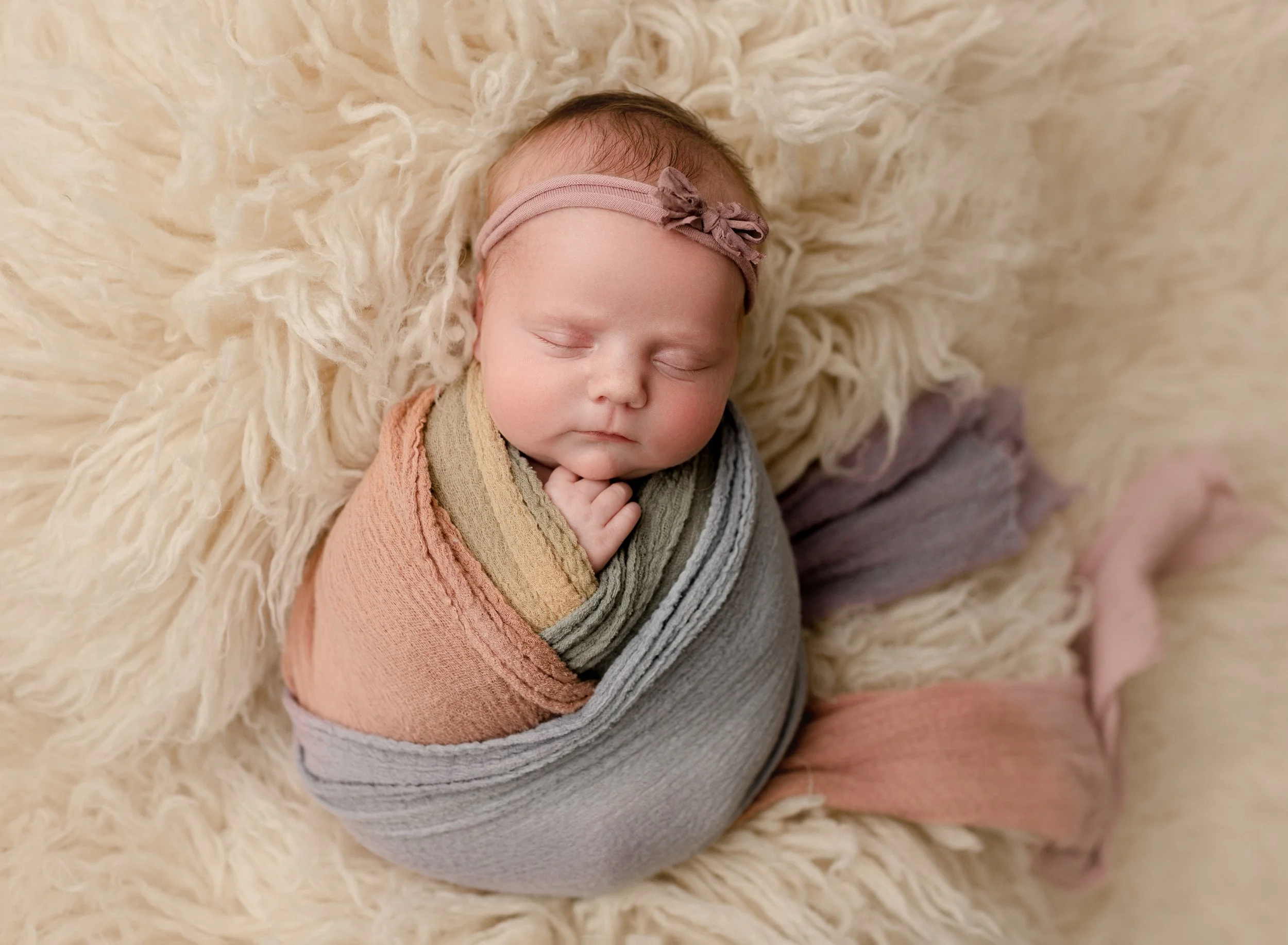 pastel-rainbow-swaddle-newborn.jpg