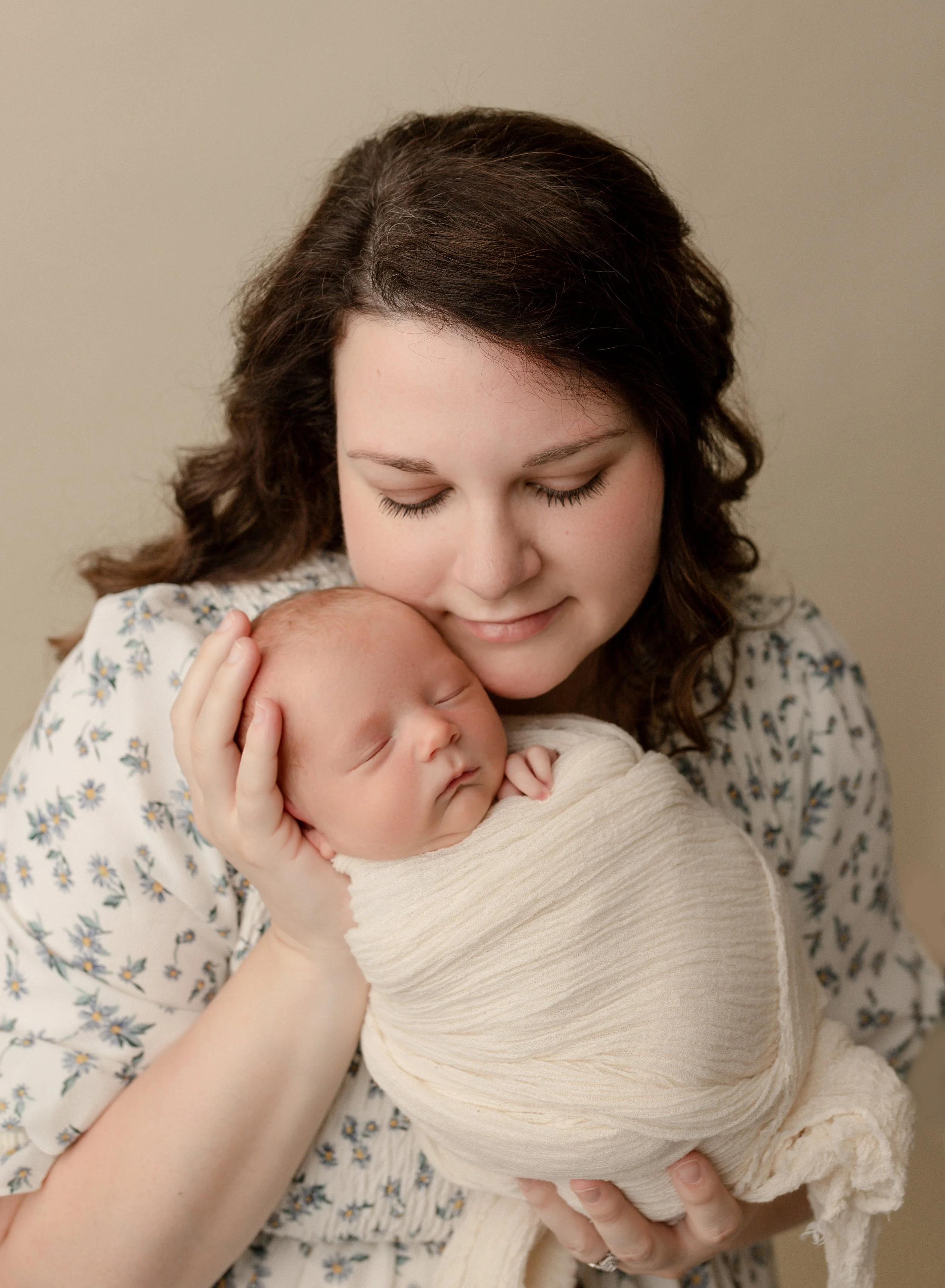 mother-holding-sleeping-baby.jpg