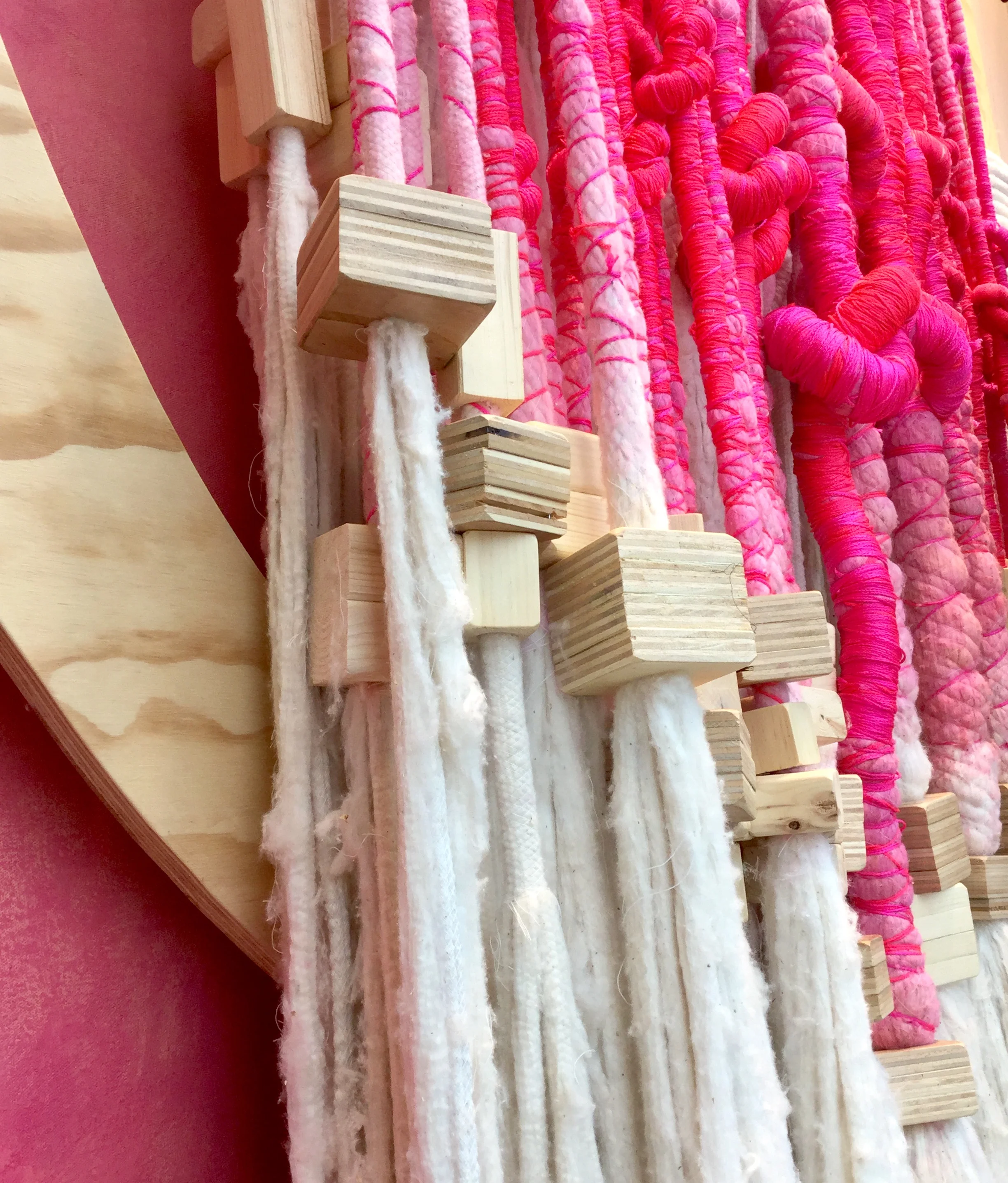  Tassels is an installation based concept that explores a simple composition yet an activation of space.  By keeping the composition calm the mass of tassels can be showcased.  It is a mixed material palette that emphasizes the vertical line, texture