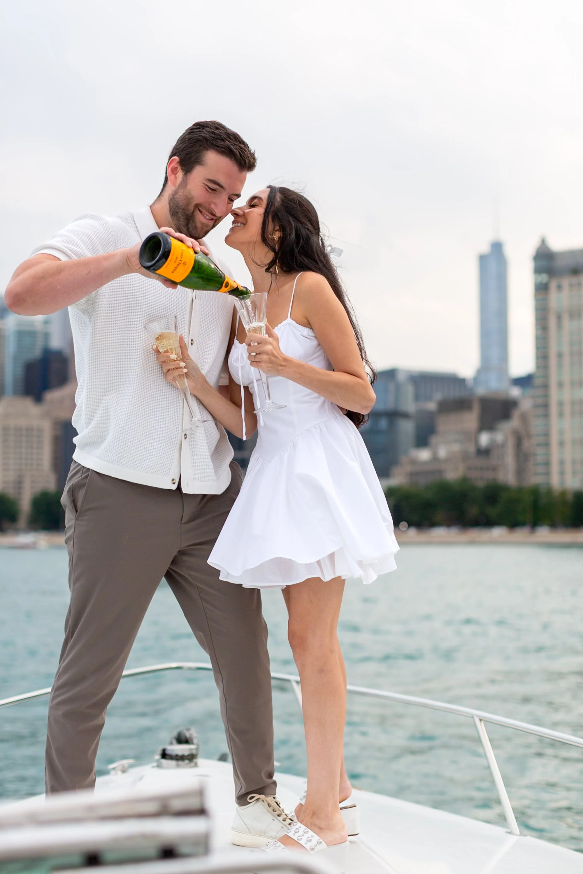 250822_Mike_Madeline_EngagementSessiononBoatChicagoPlaypenChicagoRiver__I9A9748.jpg
