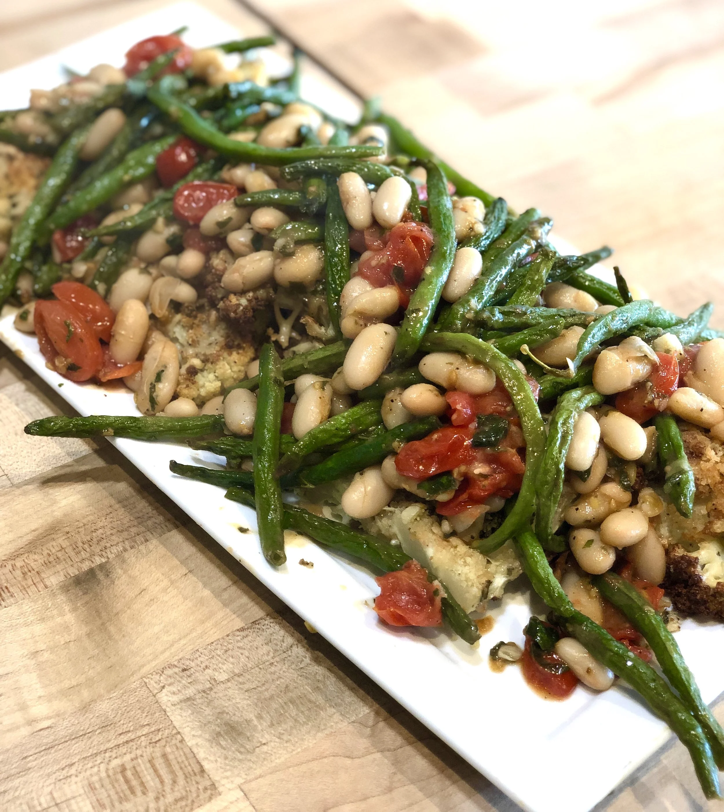 Herb-Crusted Cauliflower Steaks with Beans and Tomato