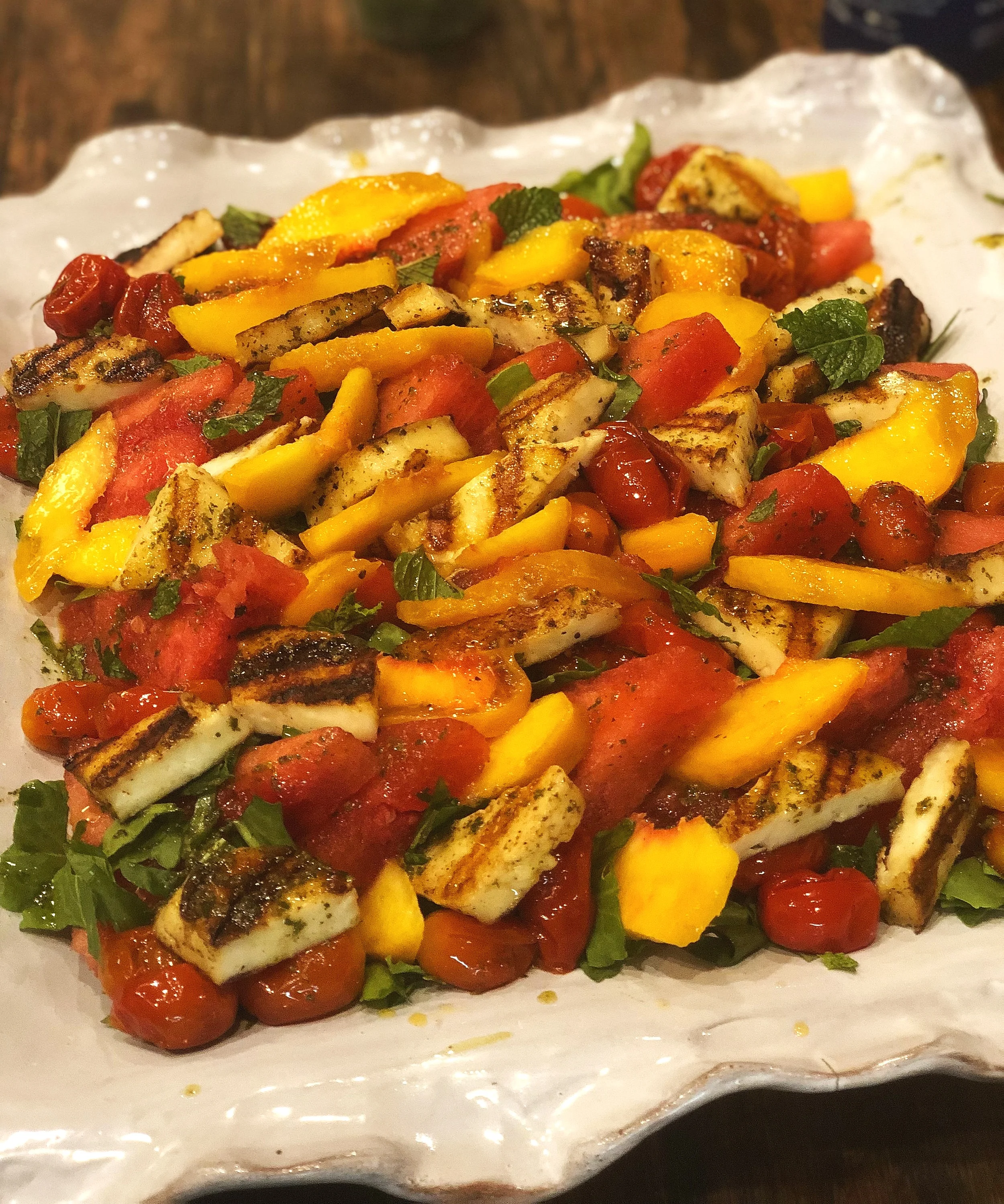 We tucked in some fresh peaches into this salad