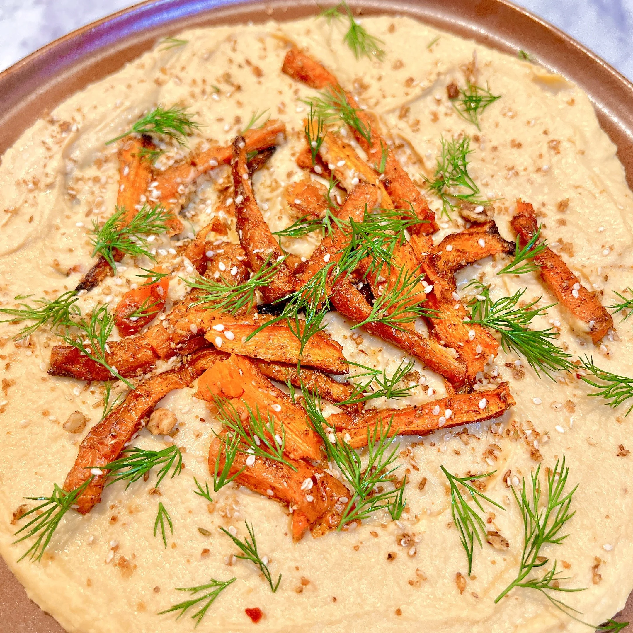 Carrots with Dukkah over Hummus