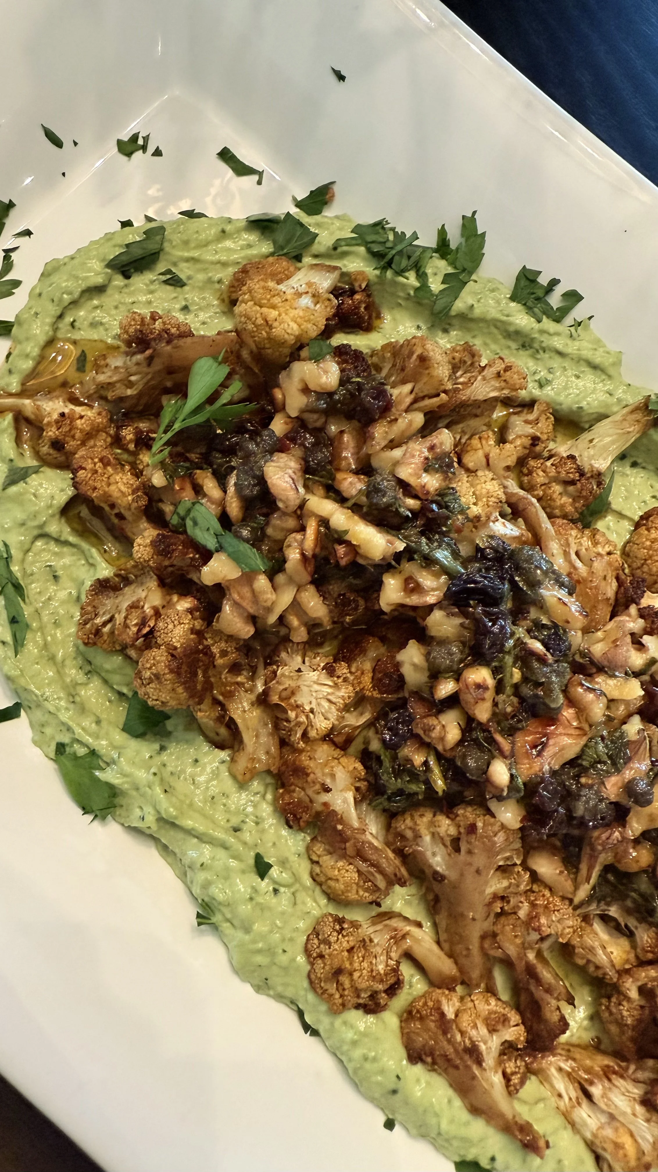 Roasted Cauliflower with Walnut-Caper Salsa and Green Tahini Sauce 