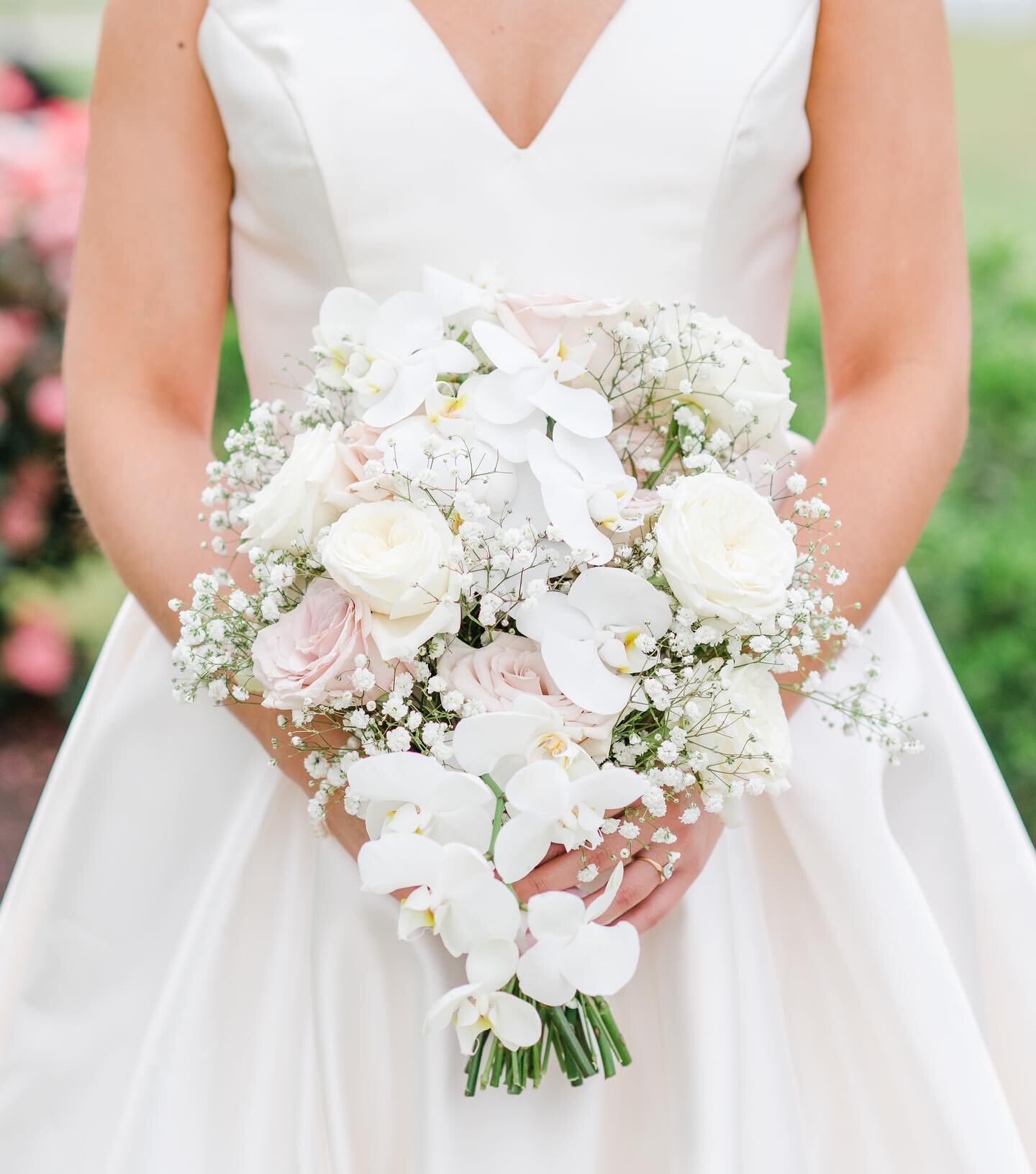 Happy Tuesday friends! We wanted to start the week off sharing a few of our favorites from Jen + Steven&rsquo;s wedding at Oakdale. Jen wanted a one of a kind bouquet featuring phalaenopsis orchids. The result was elegant, modern with a touch of whim