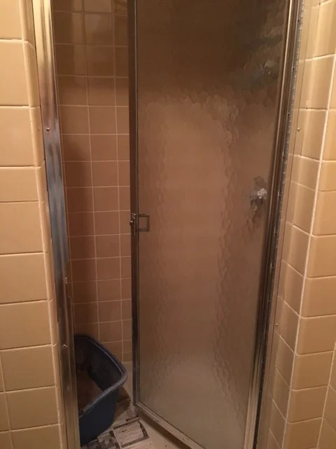 fun bathroom stripe bathroom before.JPG