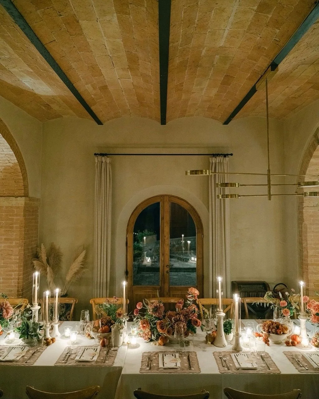 The rehearsal dinner set the tone for the days to come.

For this evening in Tuscany, the couple wanted the table to feel alive &mdash; not styled to be admired from afar, but meant to be shared.
⠀⠀⠀⠀⠀⠀⠀⠀⠀
Grapes, tomatoes and Parmigiano were woven i
