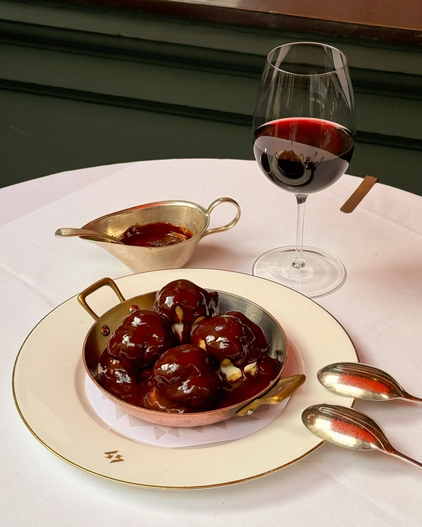 Choux pastry, served with vanilla ice cream, and a rich Armagnac chocolate sauce.