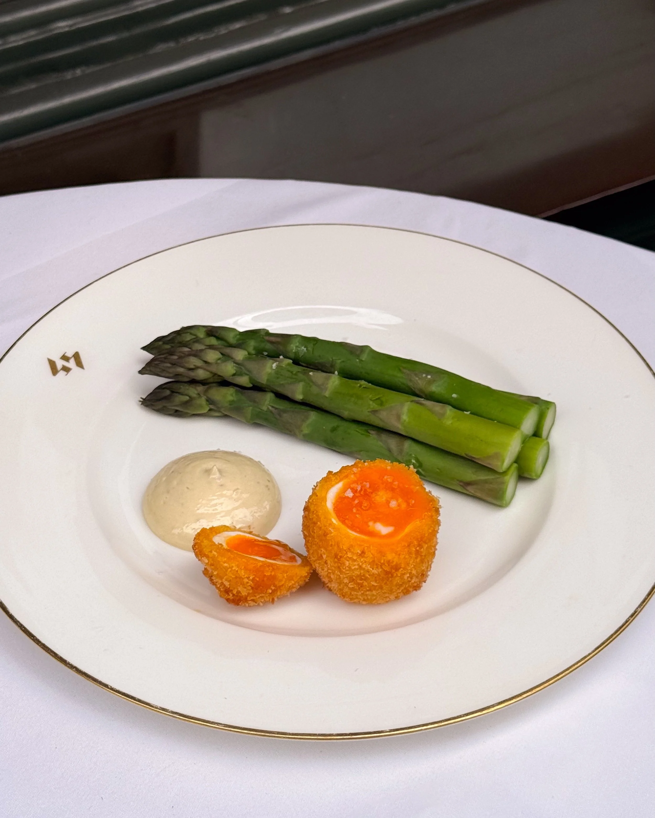 Asparagus, in season and on the menu.

Served with a crispy soft-boiled egg and smoked anchovy mayonnaise. Simple, but considered.

On our lunch and dinner menus.
