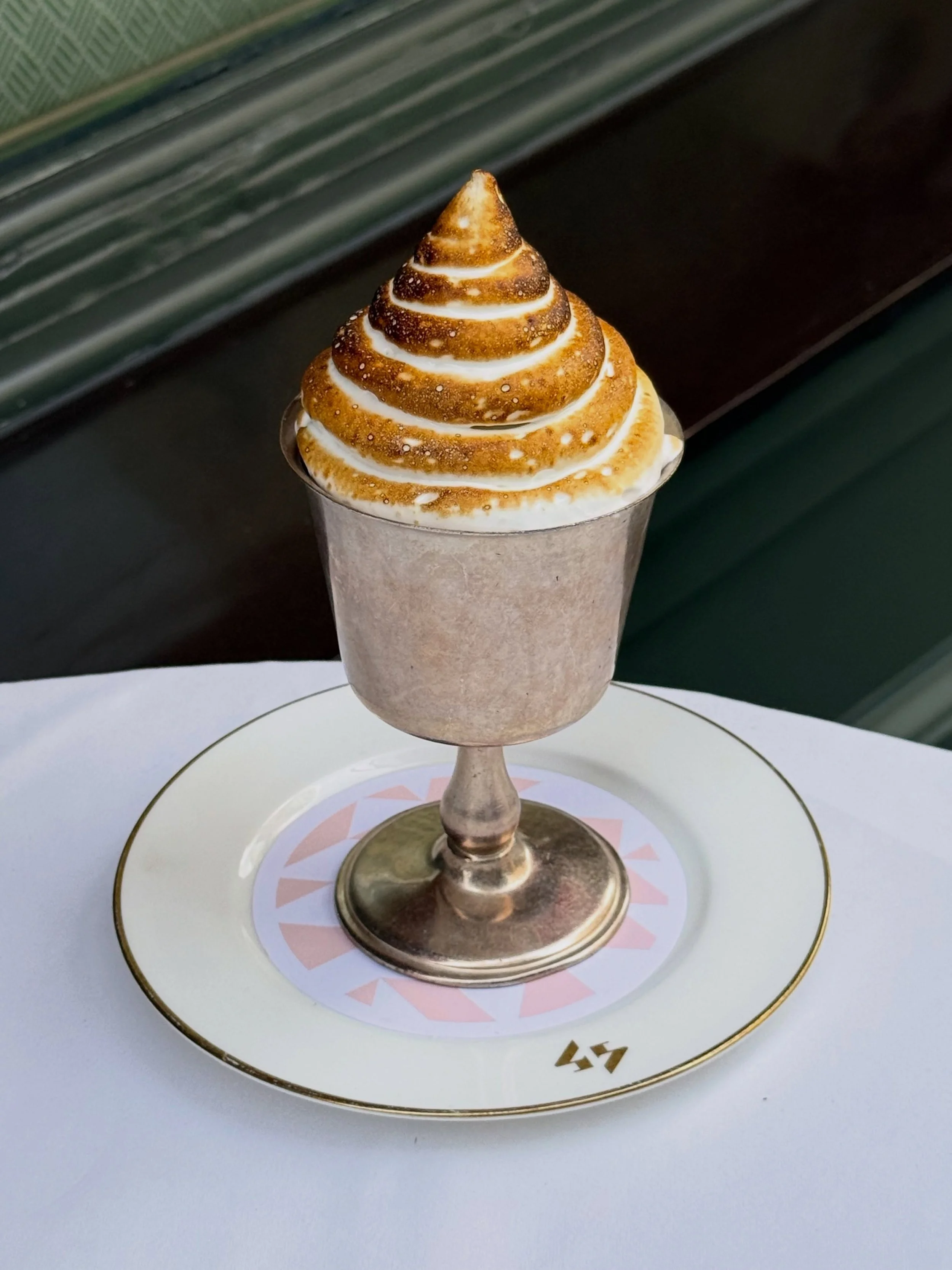 Lemon Meringue Coupe - layers of vanilla and lemon curd ice cream, topped with Italian meringue.

Something sweet, with a little sharpness.