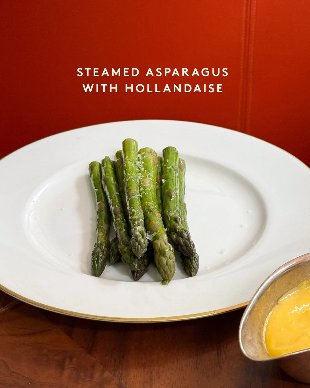 Steamed asparagus with hollandaise.

Fresh, in-season asparagus served simply, with a rich hollandaise on the side.