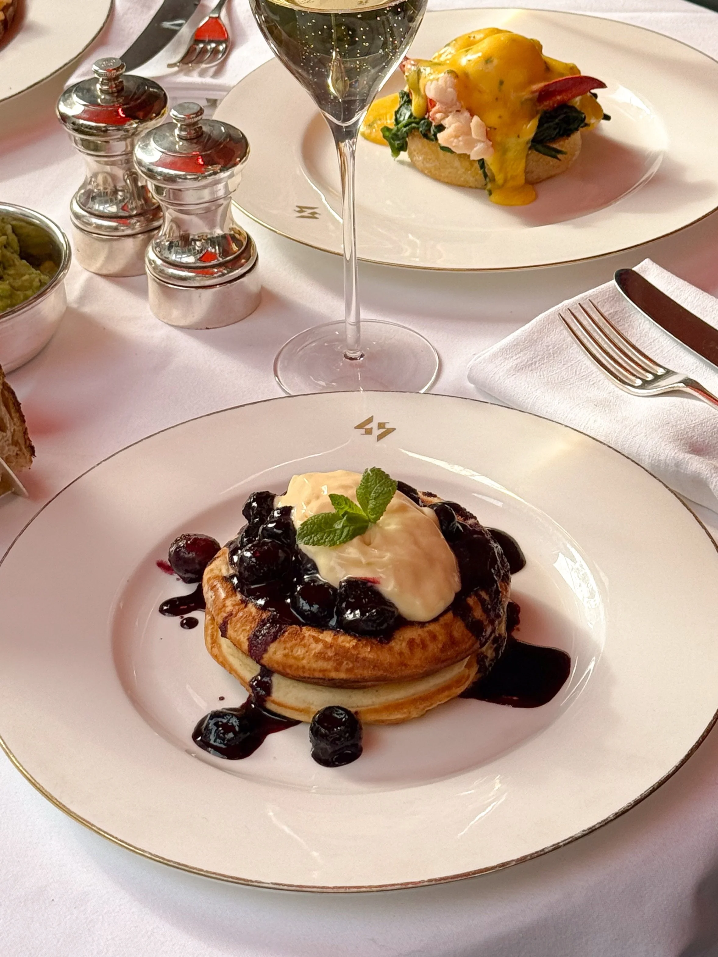 Homemade buttermilk pancakes with blueberry compote and lemon curd.

Soft, warm, and balanced with a little sharpness from the lemon.

Served on our brunch menu, Friday to Sunday.