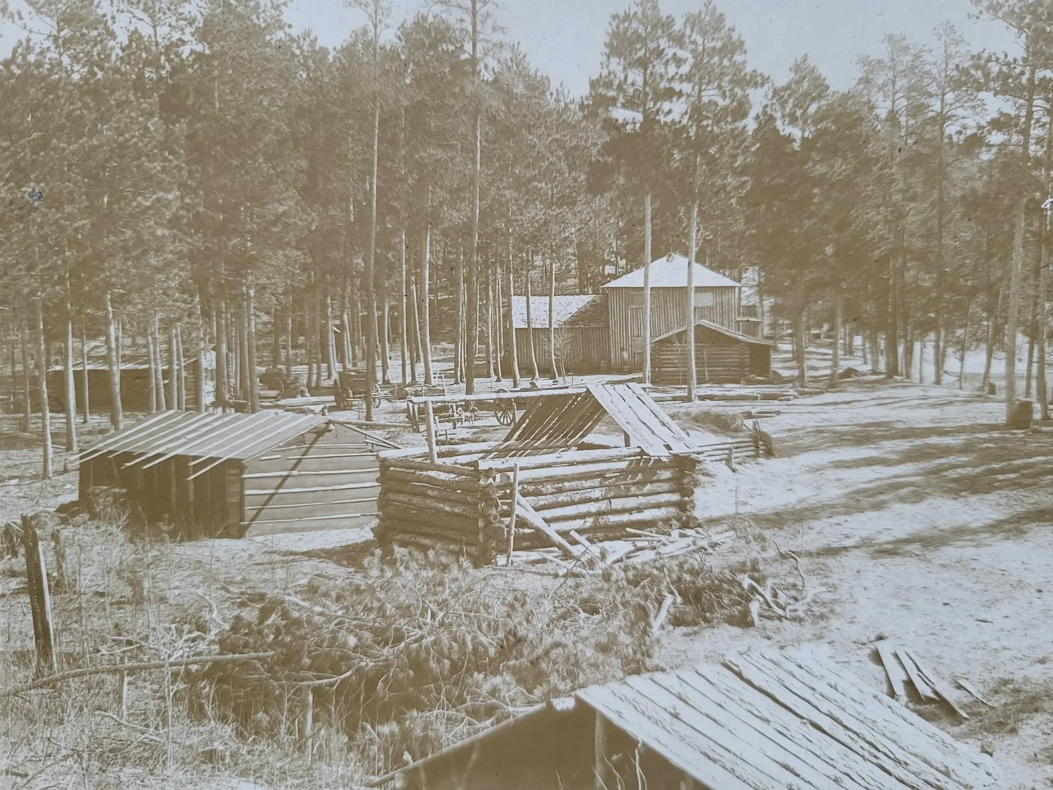 early 1900 build - two story lodge in background (it burned).jpg