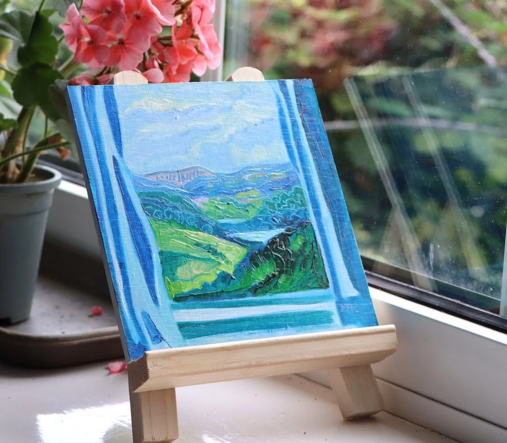 Mary kemp distant hills on windowsill.JPG