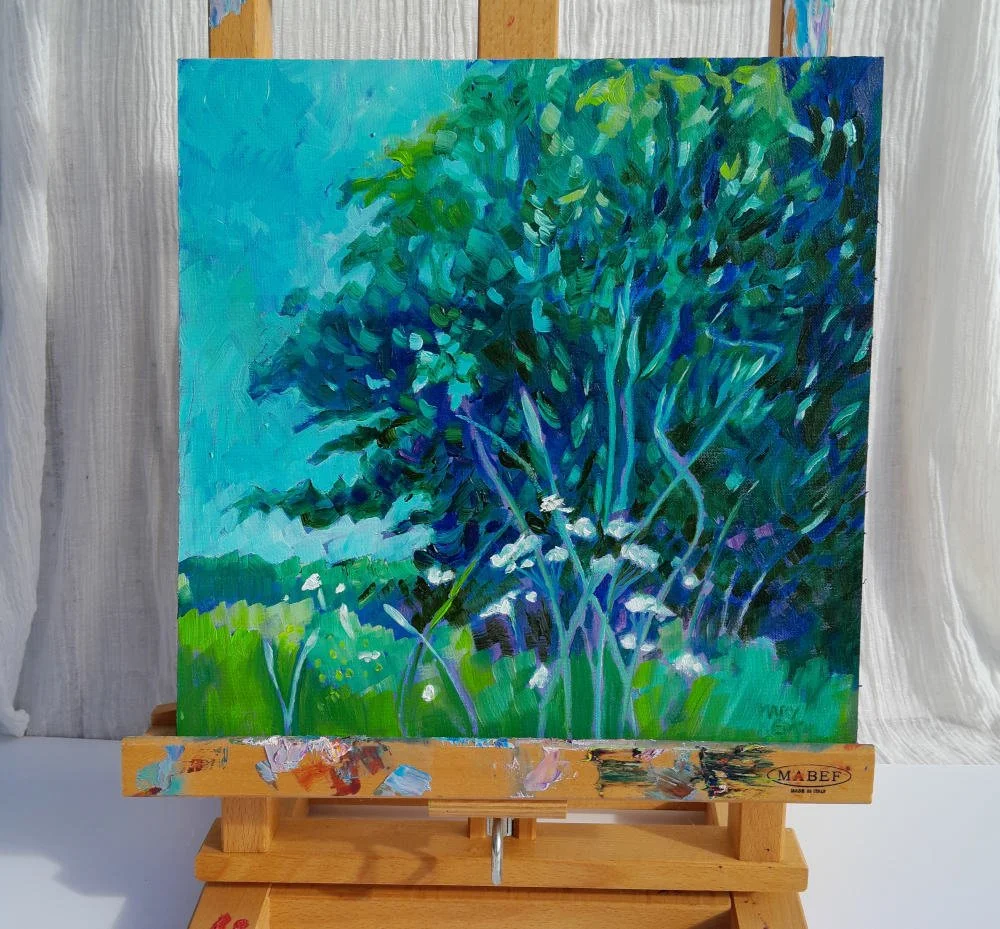 Mary Kemp Trees Blue and Green on easel .jpg
