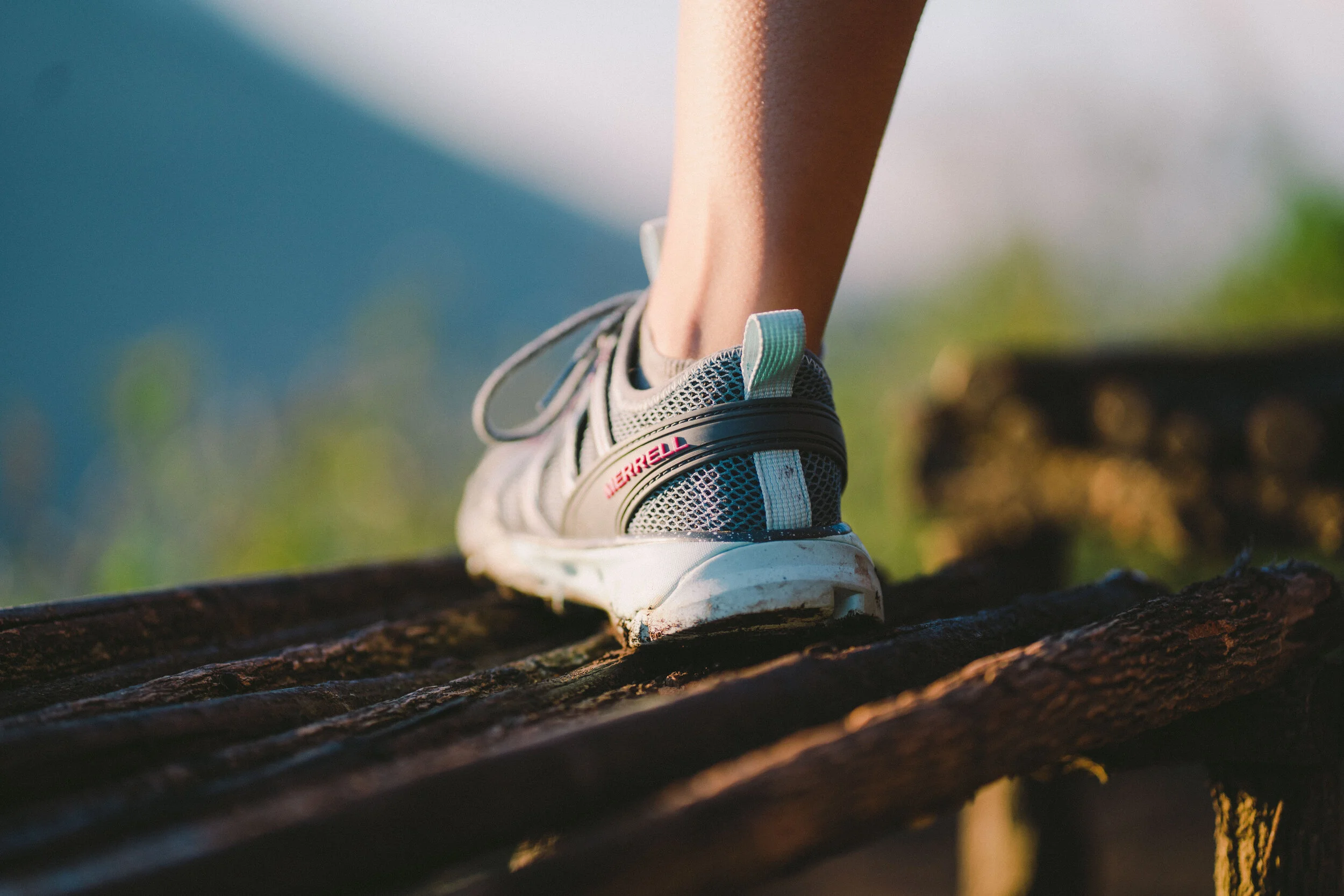 Merrell close-up in Bali sunrise.