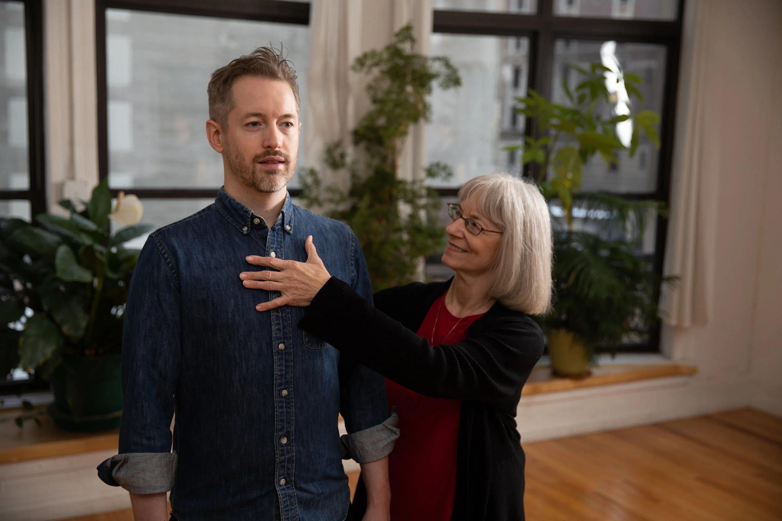 Ann Rodiger helping her student Jay Foote find a silent, free, and easy inhale.