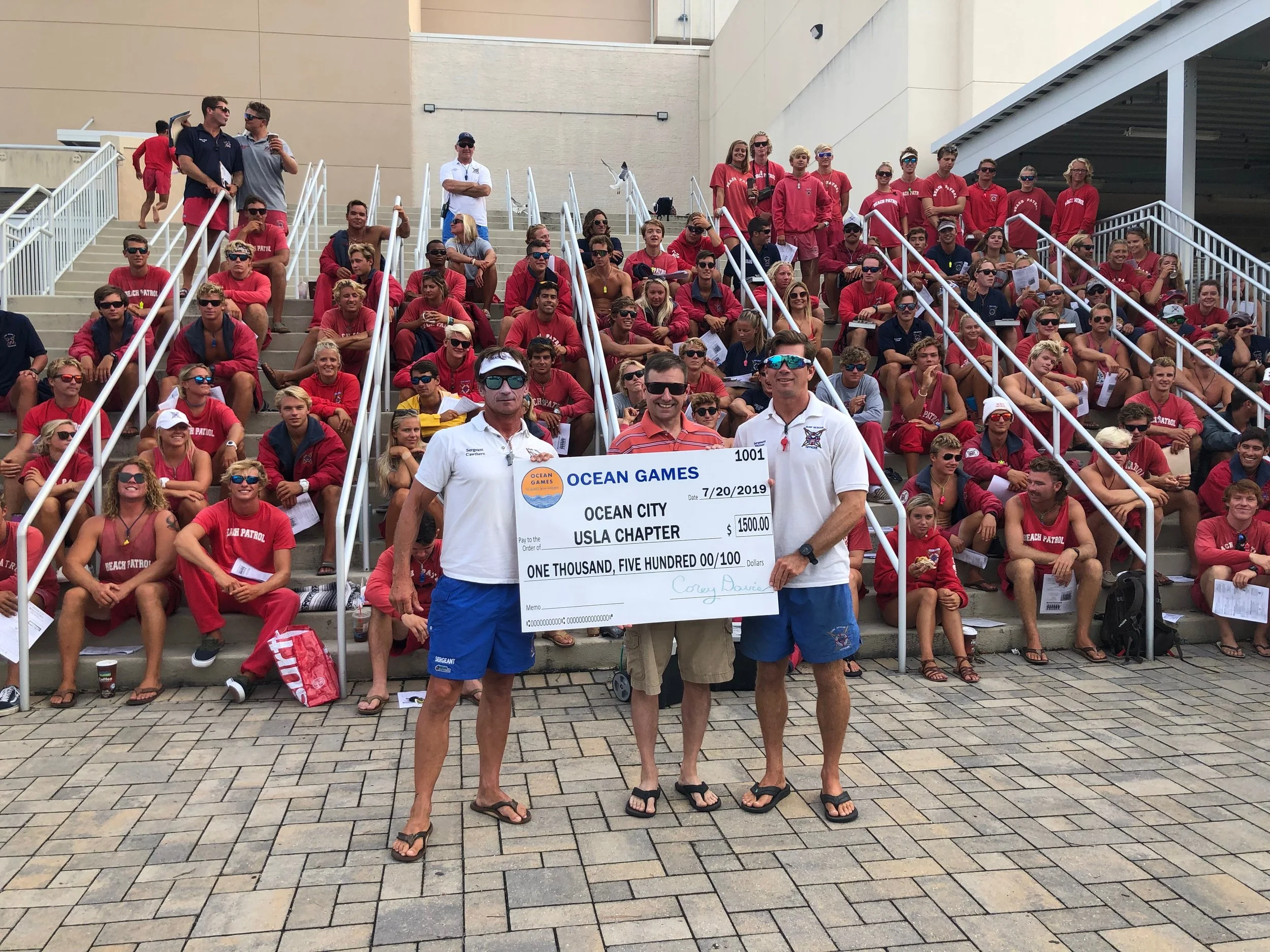 Swim Ocean City Presents OCBP Chapter of USLA with $1,500 Check