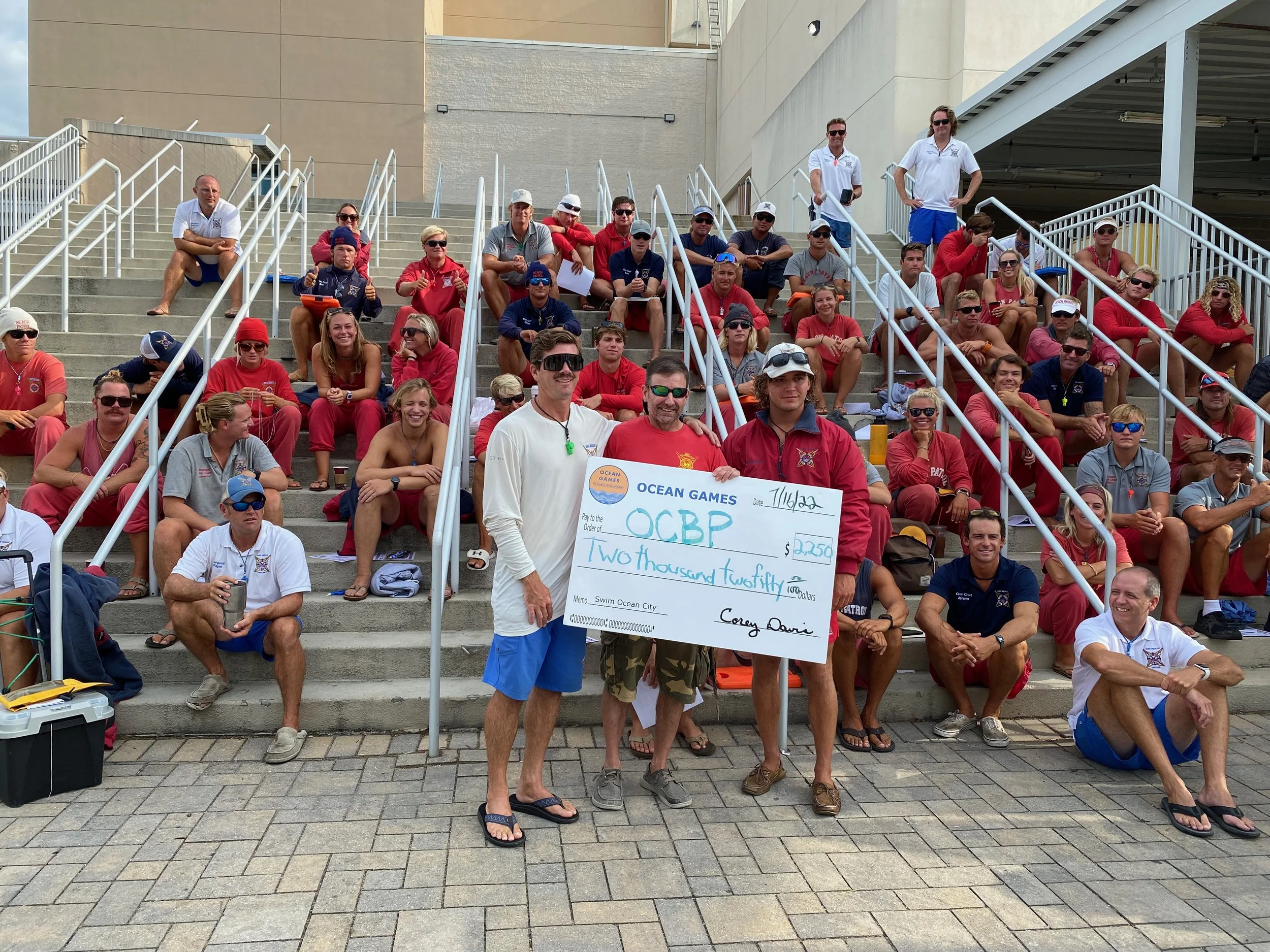 Swim Ocean City Presents OCBP Chapter of USLA with $2,250 Check