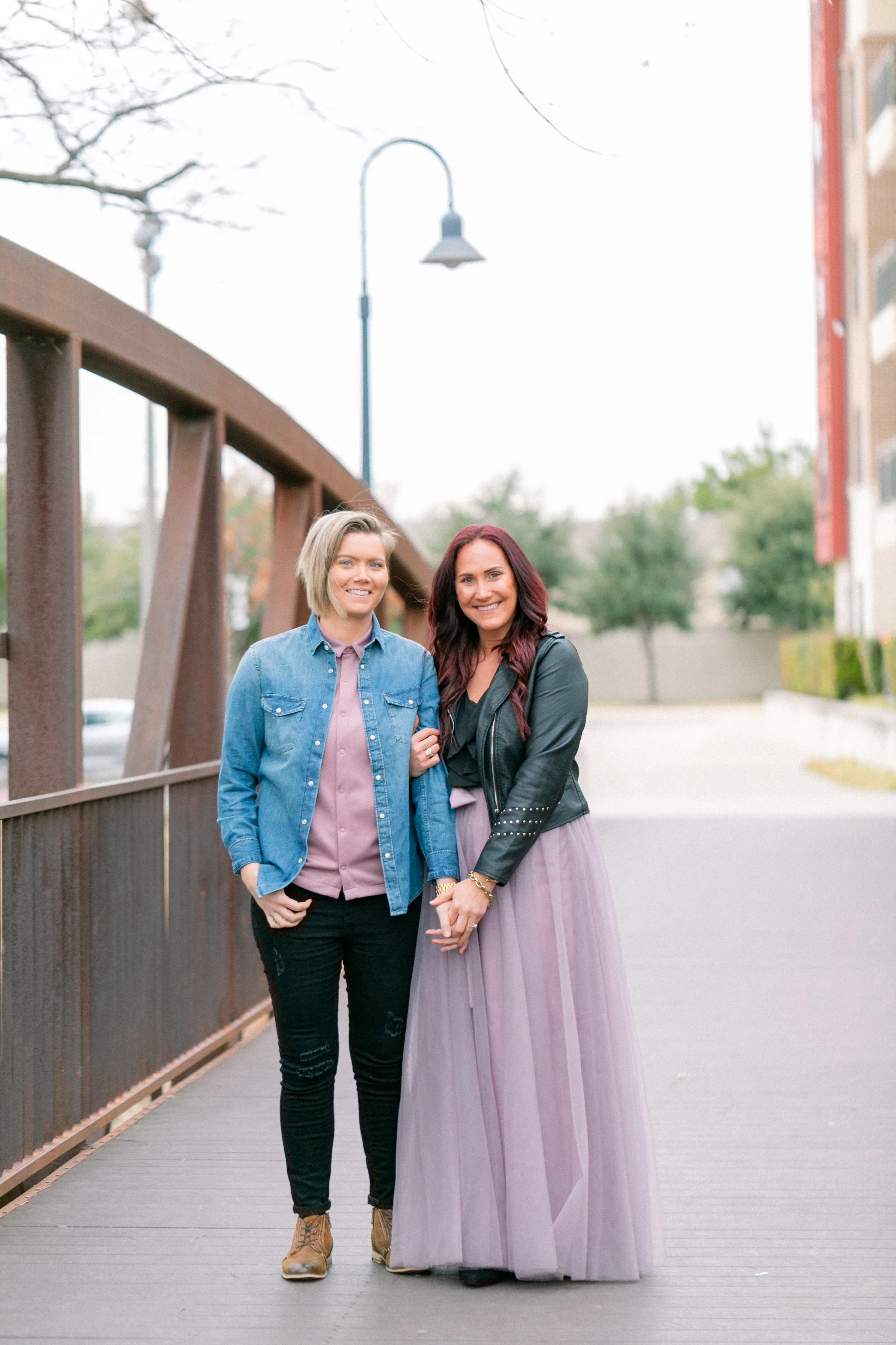 Couple downtown on city bridge