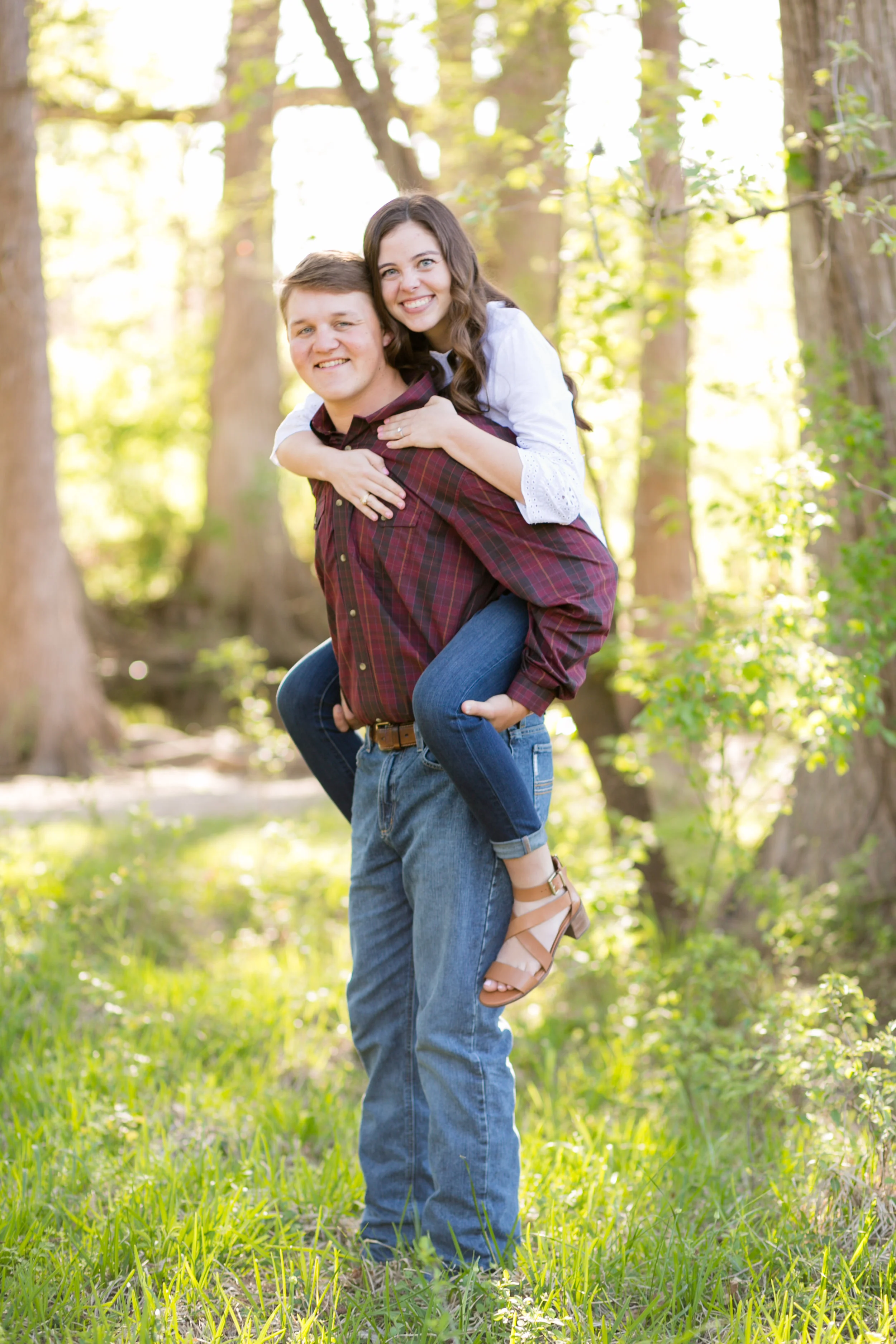 couples photo in the woods