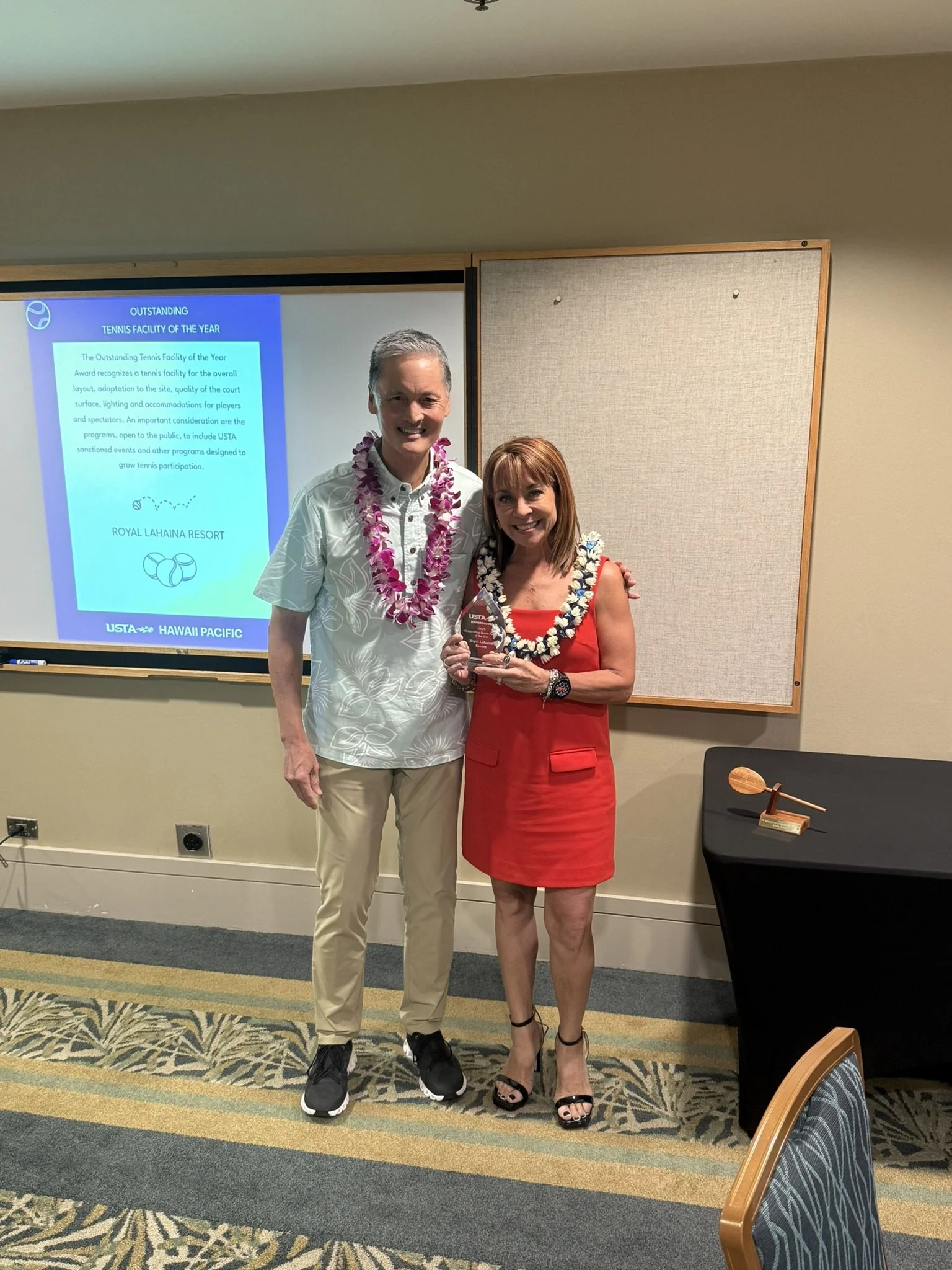Russell Lum and Yvette Kitagawa (accepting for Royal Lahaina Resort  )