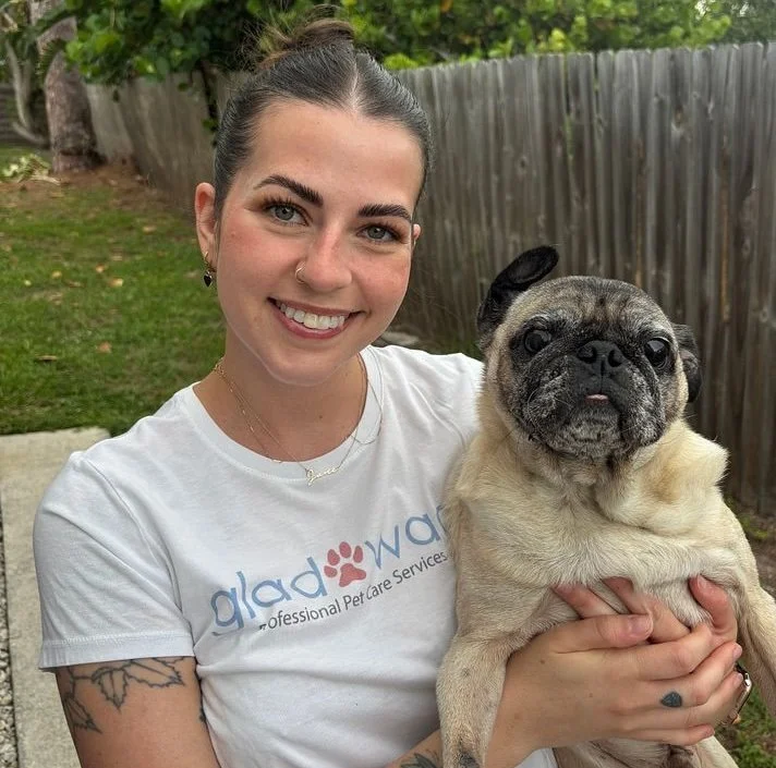 Glad Wags employee with her pug