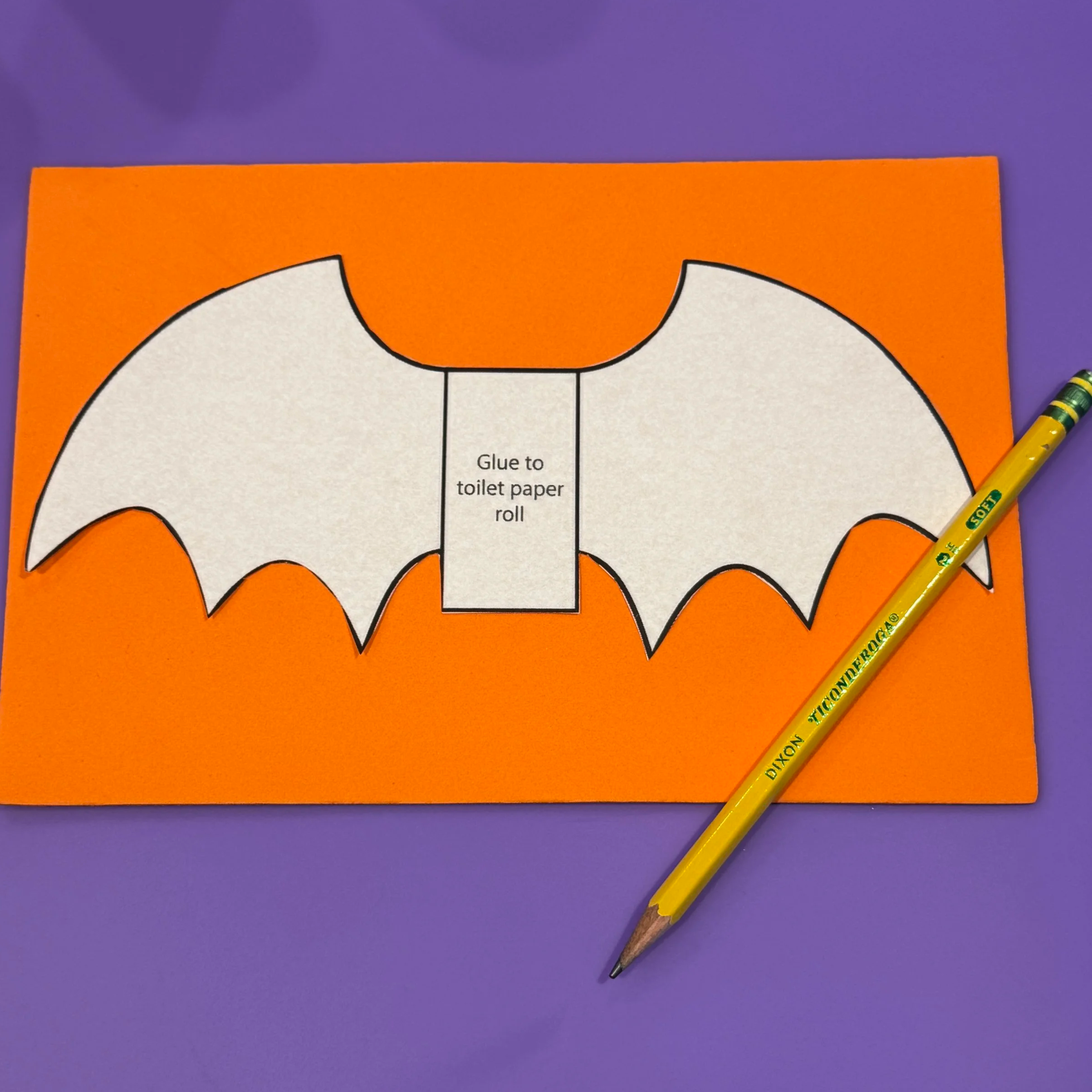 Photo of free downloadable bat wing template to print, cut, trace, and use to create your toilet paper roll bat crafts.