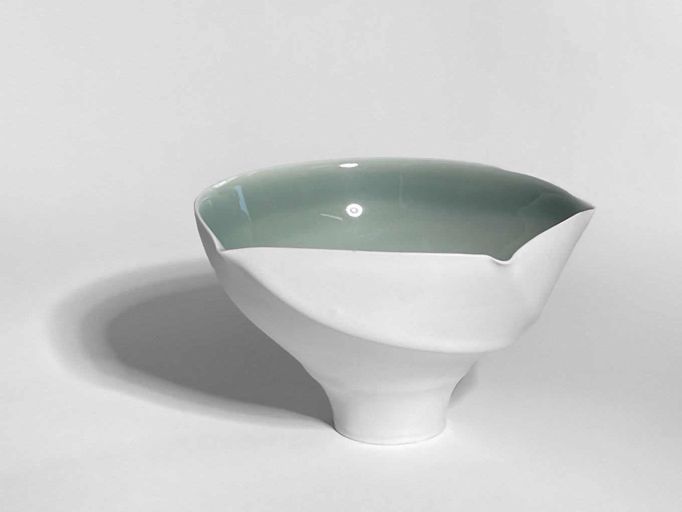 SPIRAL LIPPED BOWL ON EXTENDED FOOT