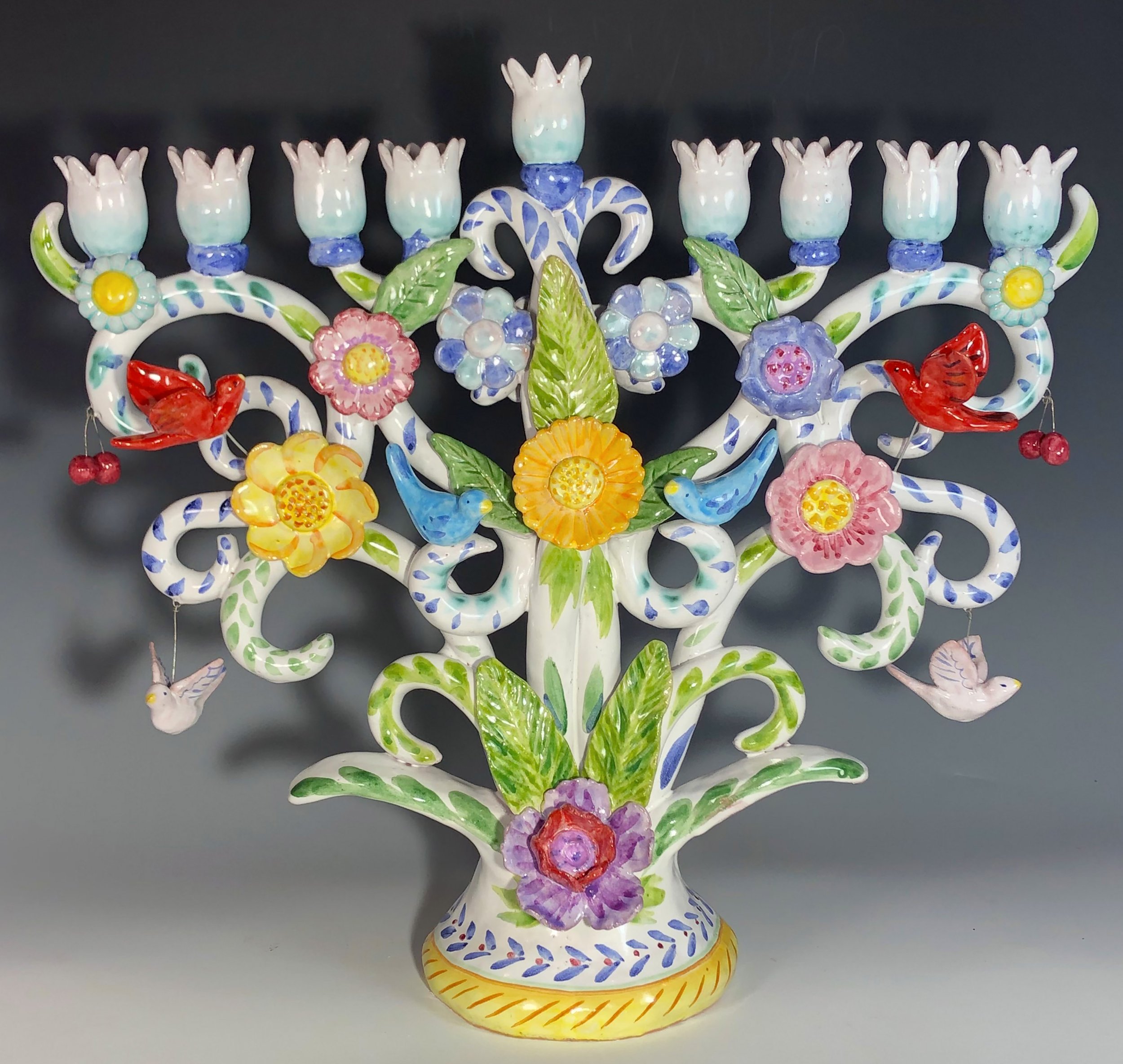 Large majolica menorah with flowers and birds