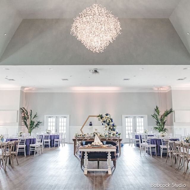 The remodeled ballroom at Sugar Valley Golf Club provides a bright neutral space that allows any event theme or colors to take center stage.⁠
⁠
The French Doors open onto balconies or have patio access letting you easily enjoy both indoor and outdoor