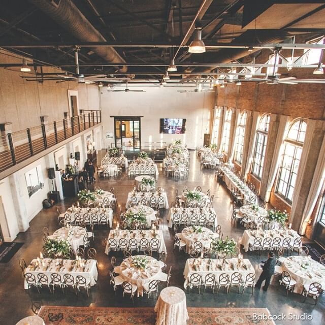 We just love the mix of table shapes with floor plans! ⁠
⁠
It adds extra interest to the room without being too crazy, and it's a great way to shake up your centerpiece designs as well.⁠
⁠
Image: @sarahbabcockstudio⁠
Venue: @steamplantdayton⁠
Floral: