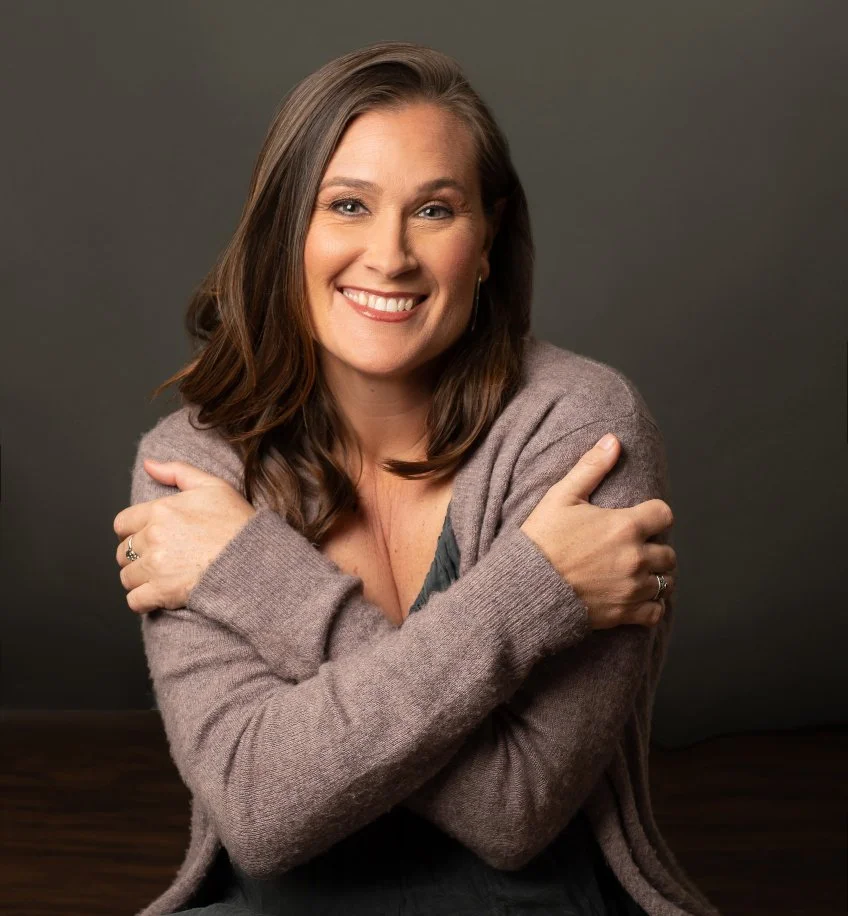 Yoga teacher Krista Oakes smiling.