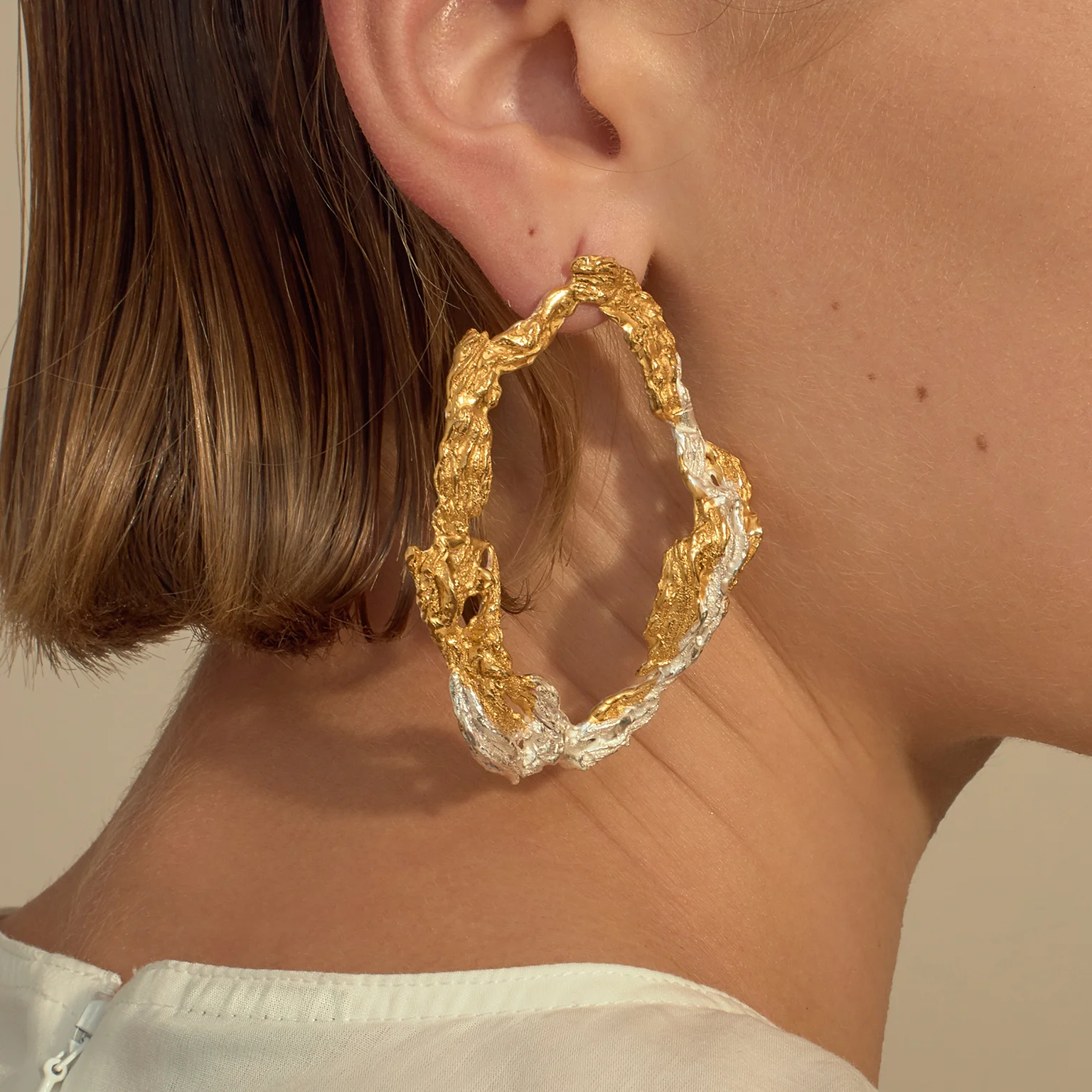 Loveness Lee Dzovag Earrings Model closeup Trans-natural Collection